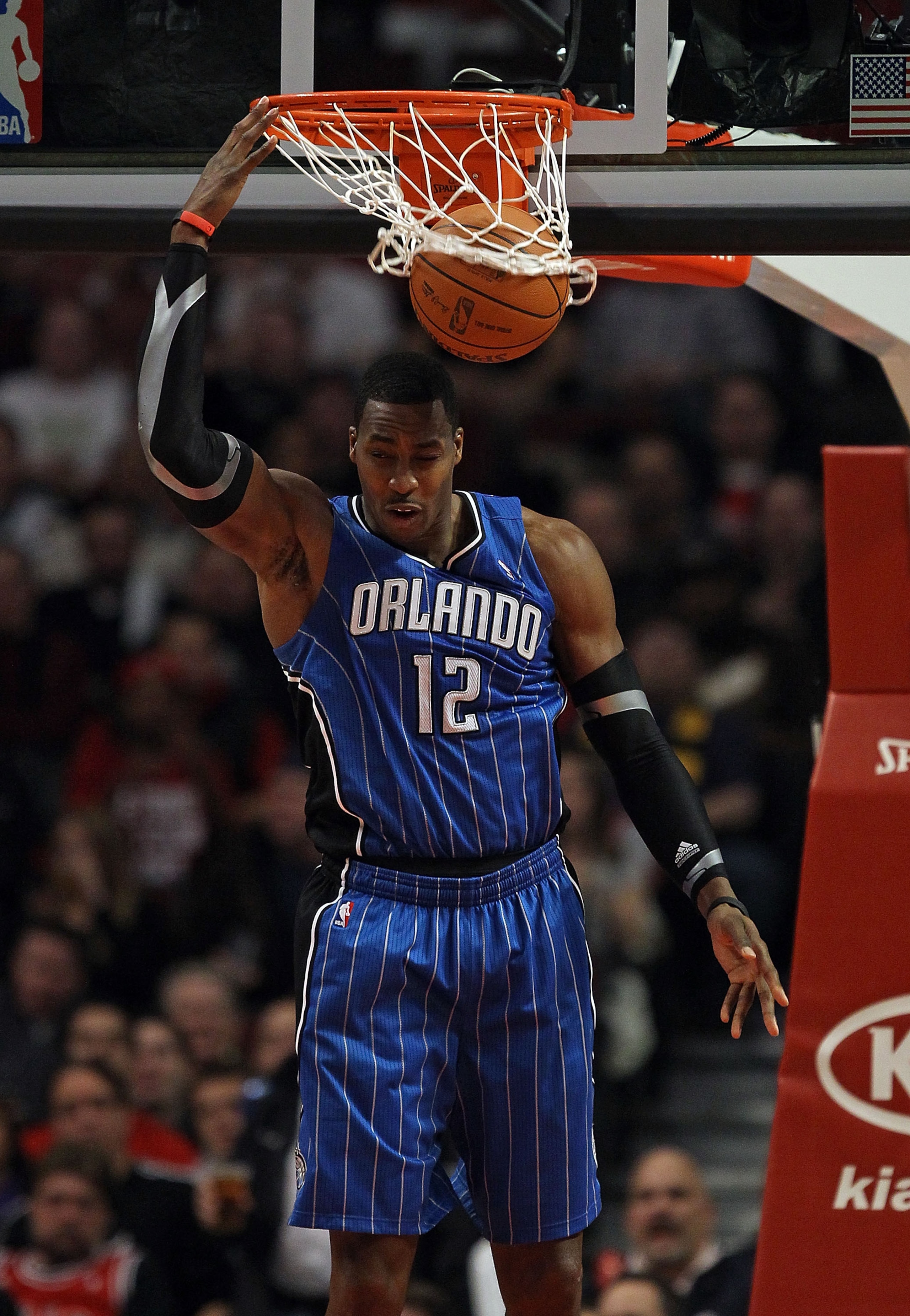 CHICAGO, IL - JANUARY 28: Dwight Howard #12 of the Orlando Magic dunks the ball for two of his game-high 40 points against the Chicago Bulls at the United Center on January 28, 2011 in Chicago, Illinois. The Bulls defeated the Magic 99-90. NOTE TO USER: U