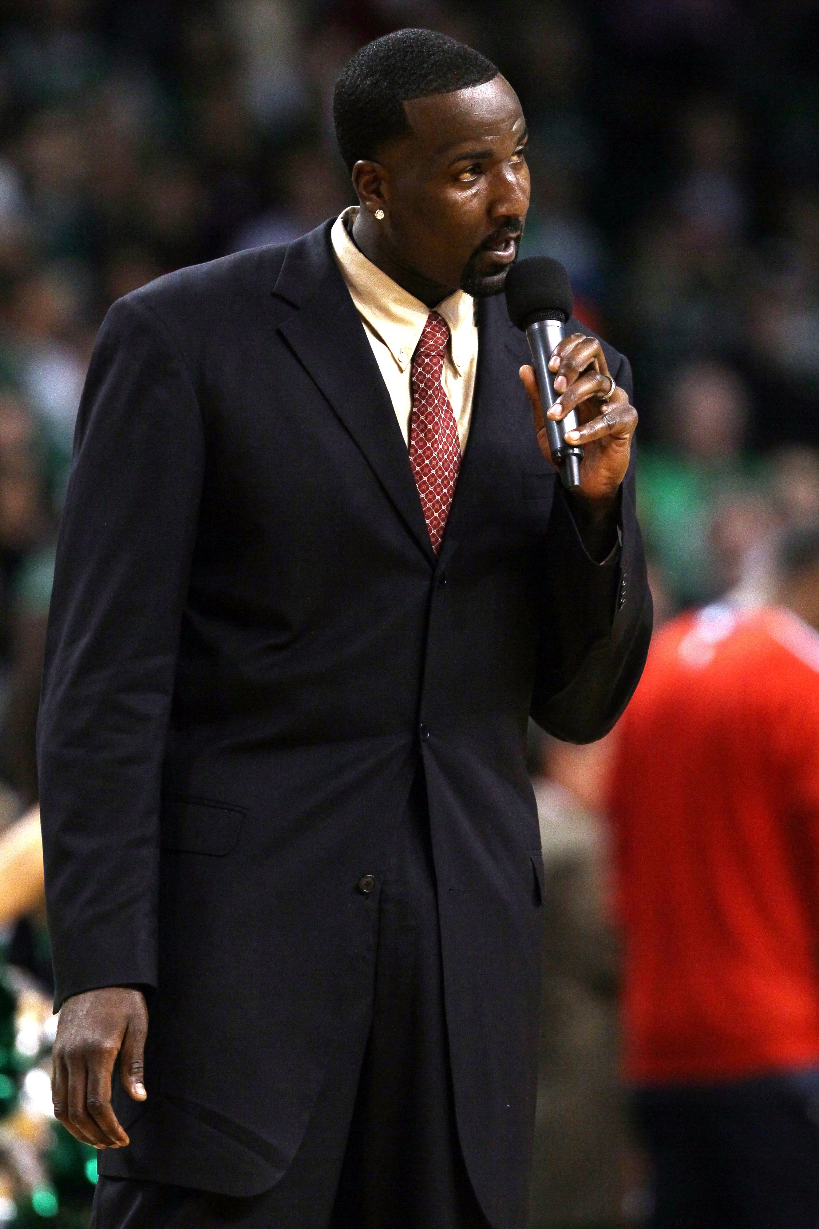 BOSTON - NOVEMBER 24:  Kendrick Perkins #43 of the Boston Celtics addresses the fans before the game against the New Jersey Nets on November 24, 2010 at the TD Garden in Boston, Massachusetts. NOTE TO USER: User expressly acknowledges and agrees that, by
