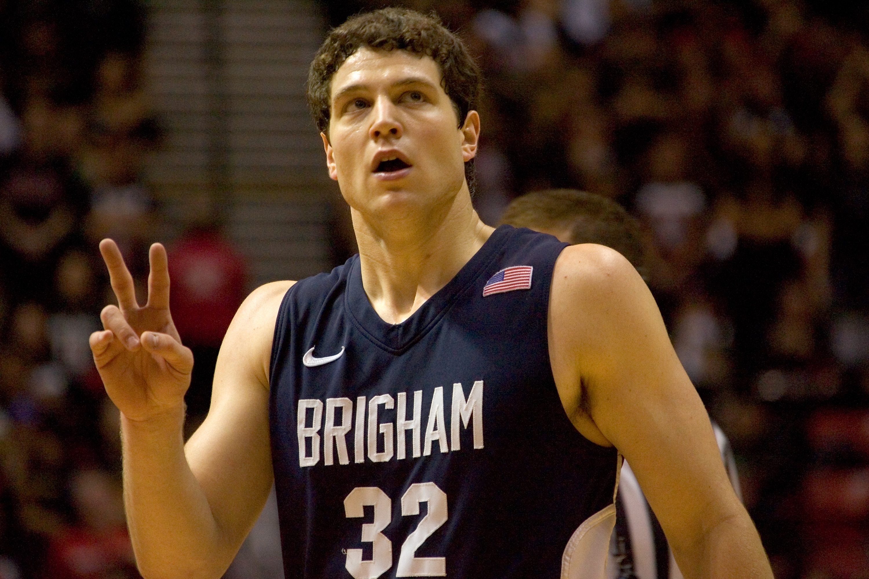 SAN DIEGO, CA - FEBRUARY 26:  Jimmer Fredette #32 of the Brigham Young Cougars reacts to being fouled against the San Diego State Aztecs during the second half at Cox Arena on February 26, 2011 in San Diego, California. BYU beat SDSU 80-67. (Photo by Kent