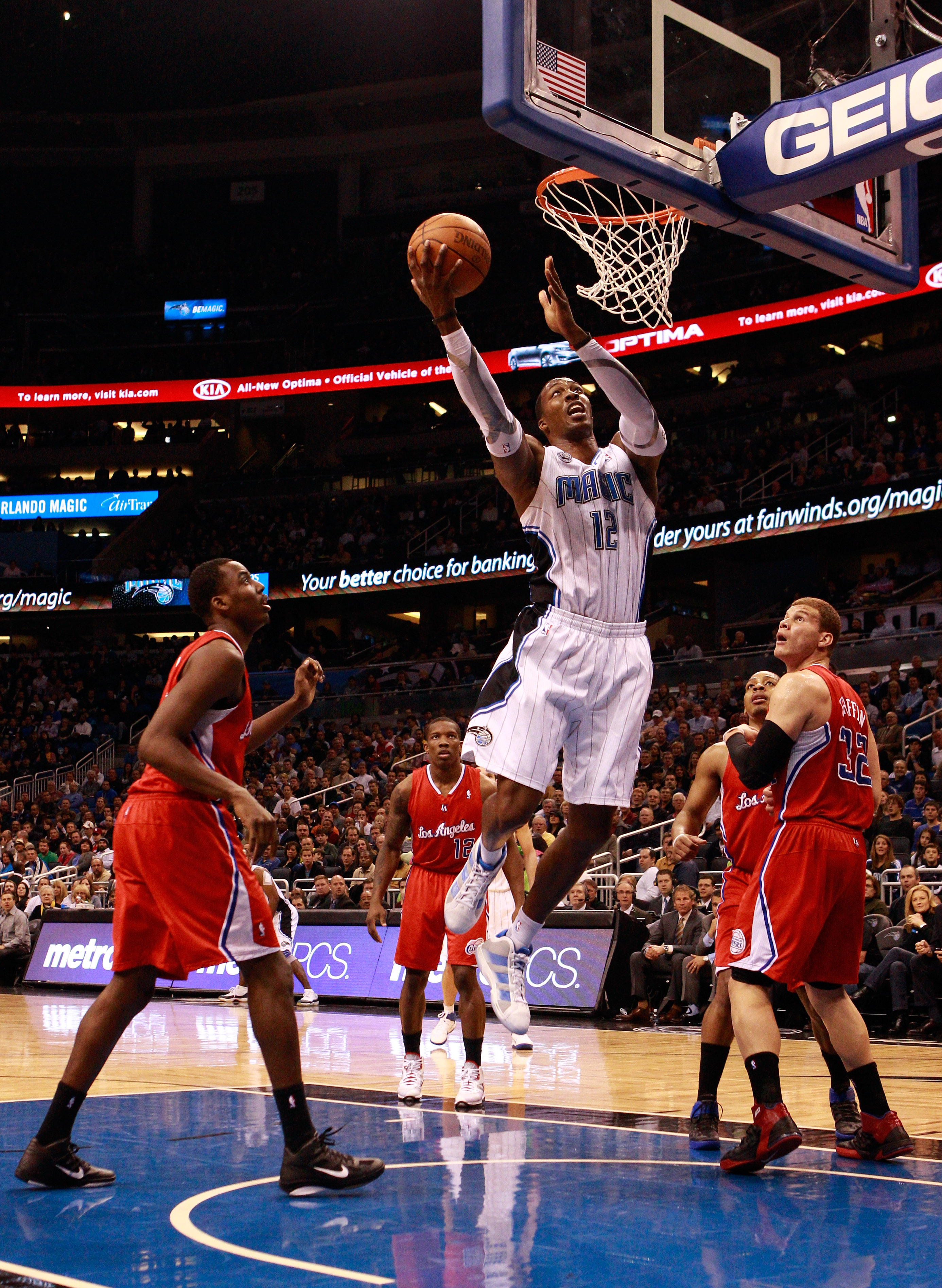 ORLANDO, FL - FEBRUARY 08:  Dwight Howard #12 of the Orlando Magic attempts a shot during a game against the Los Angeles Clippers at Amway Arena on February 8, 2011 in Orlando, Florida.  NOTE TO USER: User expressly acknowledges and agrees that, by downlo
