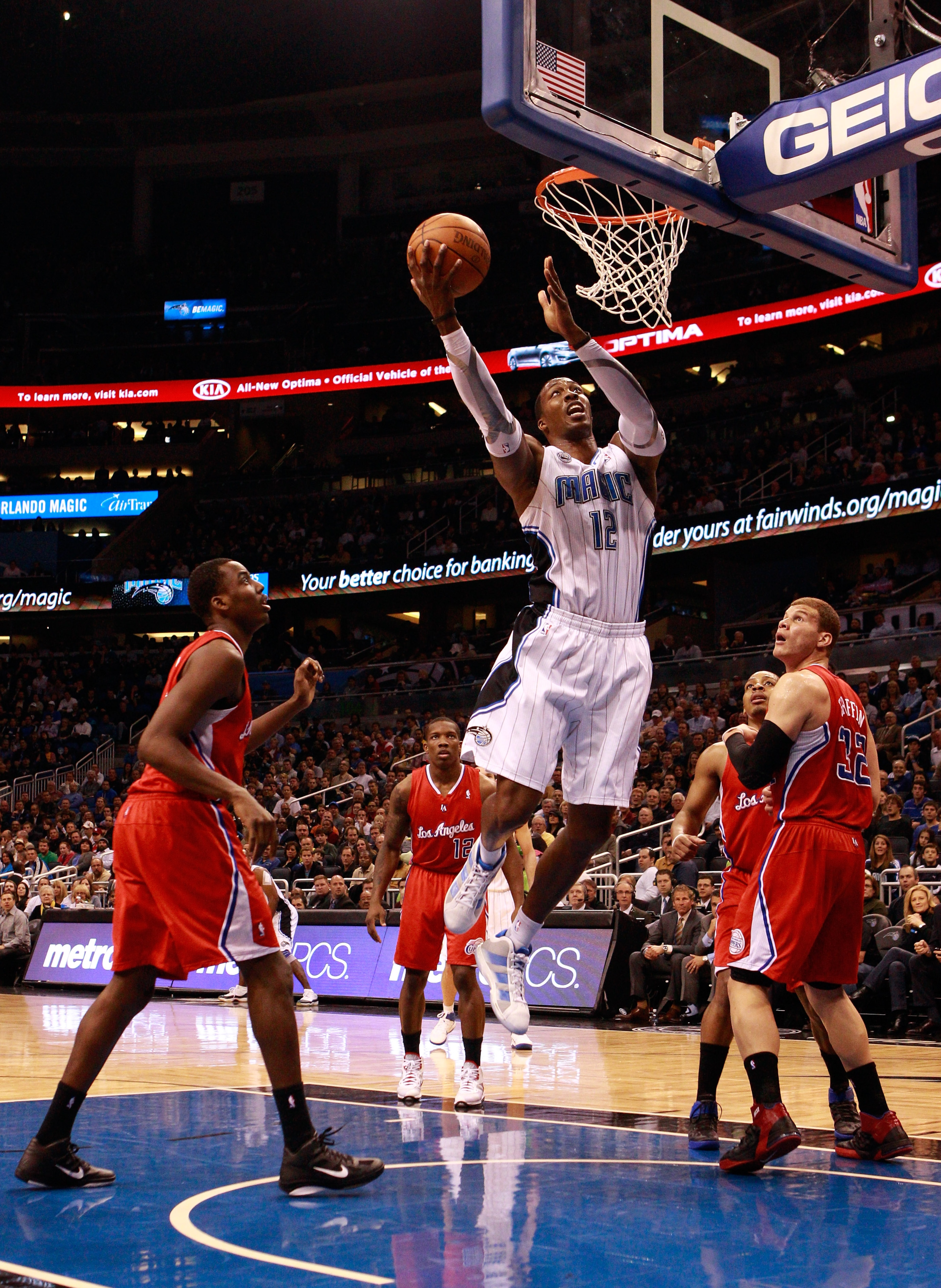 ORLANDO, FL - FEBRUARY 08:  Dwight Howard #12 of the Orlando Magic attempts a shot during a game against the Los Angeles Clippers at Amway Arena on February 8, 2011 in Orlando, Florida.  NOTE TO USER: User expressly acknowledges and agrees that, by downlo