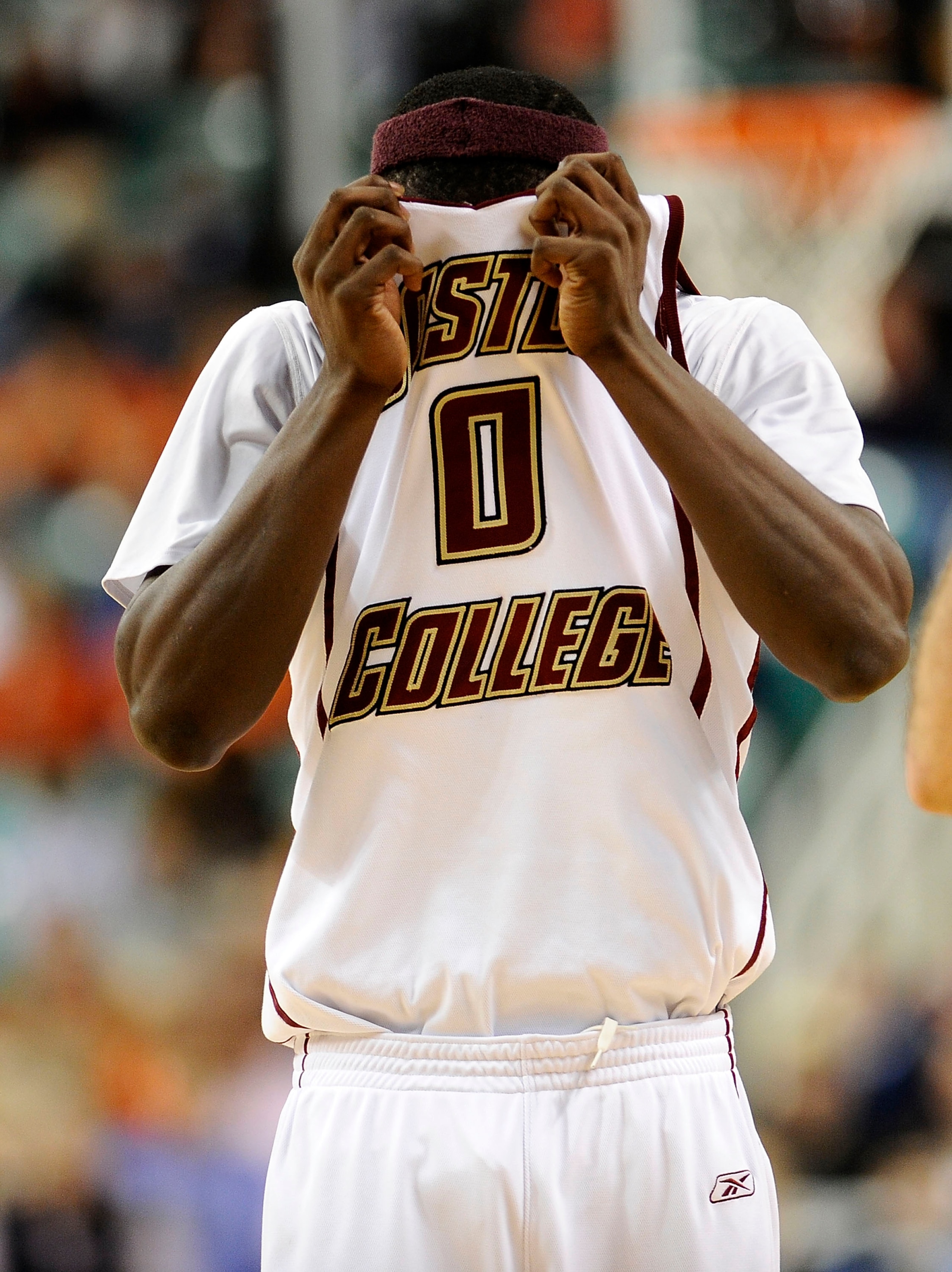 GREENSBORO, NC - MARCH 11:  Reggie Jackson #0 of the Boston College Eagles wipes his face during the first half against the University of Virginia Cavaliers in their first round game in the 2010 ACC Men's Basketball Tournament at the Greensboro Coliseum o
