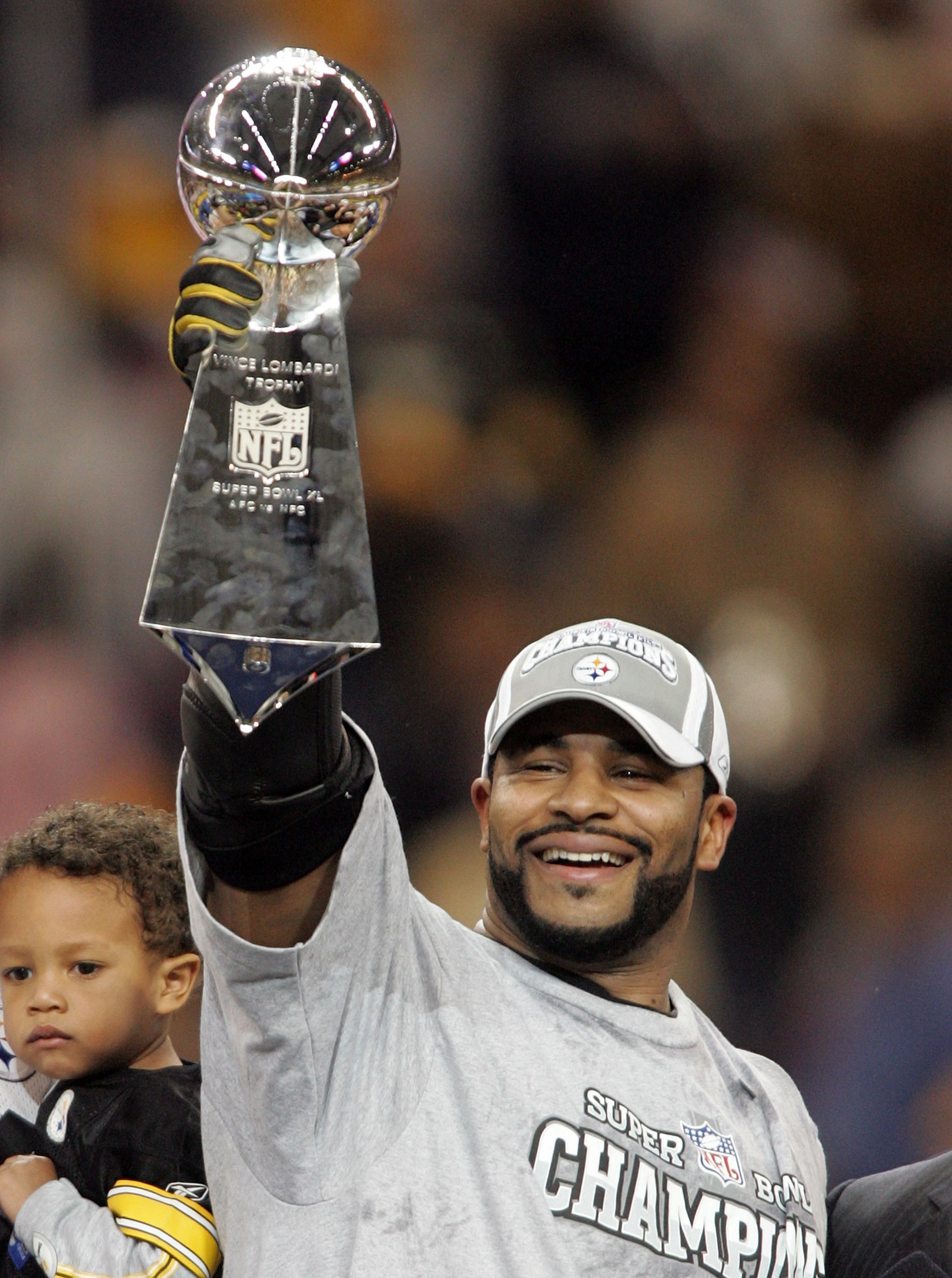 DETROIT - FEBRUARY 5: Running back Jerome Bettis #36 of the Pittsburgh Steelers celebrates with the Vince Lombardi Tropy after defeating the Seattle Seahawks in Super Bowl XL at Ford Field on February 5, 2006 in Detroit, Michigan. Bettis announced his ret