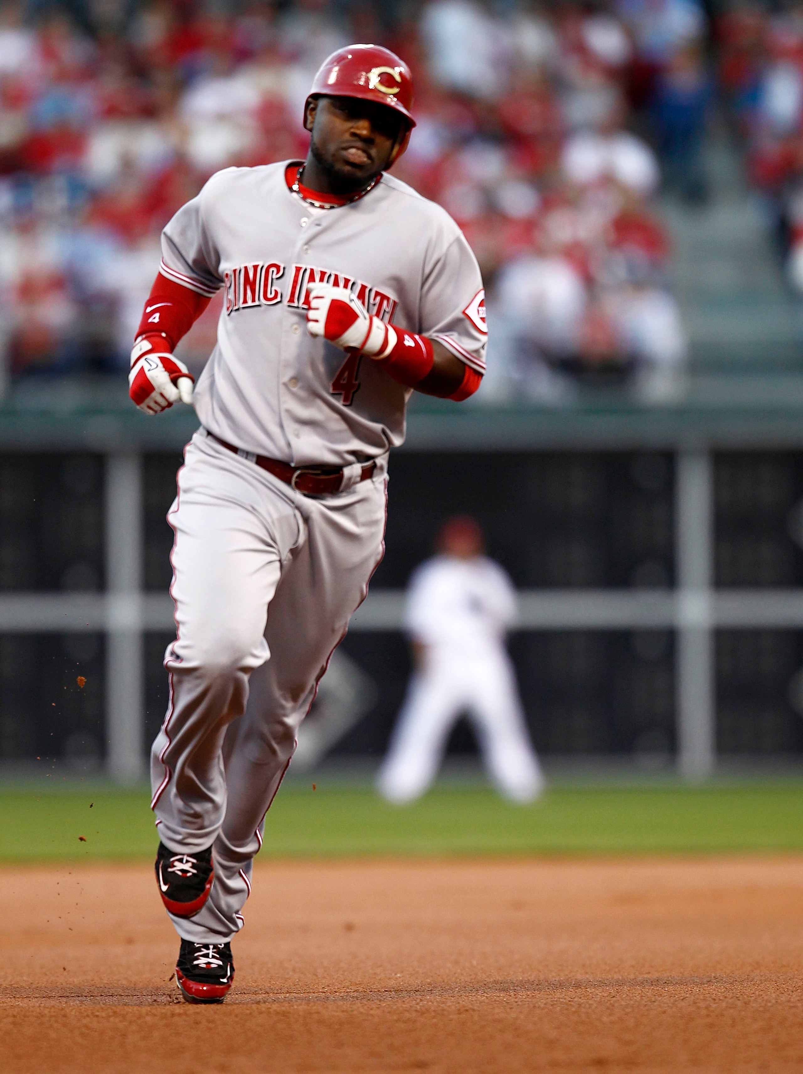 PHILADELPHIA - OCTOBER 08: Brandon Phillips #4 of the Cincinnati Reds rounds the bases on a solo home run in Game 2 of the NLDS against the Philadelphia Phillies at Citizens Bank Park on October 8, 2010 in Philadelphia, Pennsylvania. (Photo by Jeff Zele PHILADELPHIA - OCTOBER 08: Brandon Phillips #4 of the Cincinnati Reds rounds the bases on a solo home run in Game 2 of the NLDS against the Philadelphia Phillies at Citizens Bank Park on October 8, 2010 in Philadelphia, Pennsylvania. (Photo by Jeff Zele