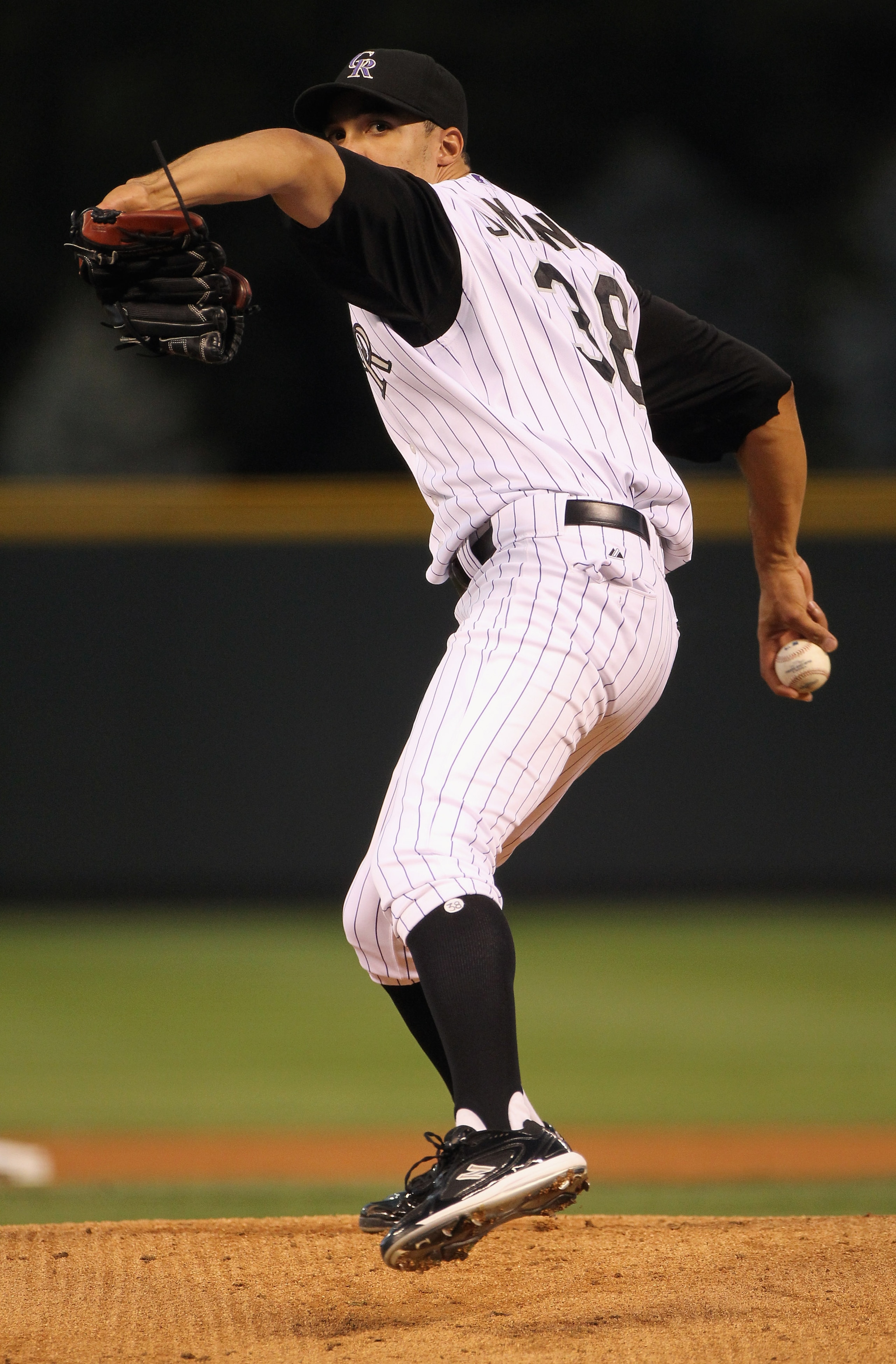 DENVER - SEPTEMBER 27:  Starting pitcher Ubaldo Jimenez #38 of the Colorado Rockies works against the Los Angeles Dodgers at Coors Field on September 25, 2010 in Denver, Colorado. Jiimenez failed to earn his 20th win of the season as the Dodgers defeated