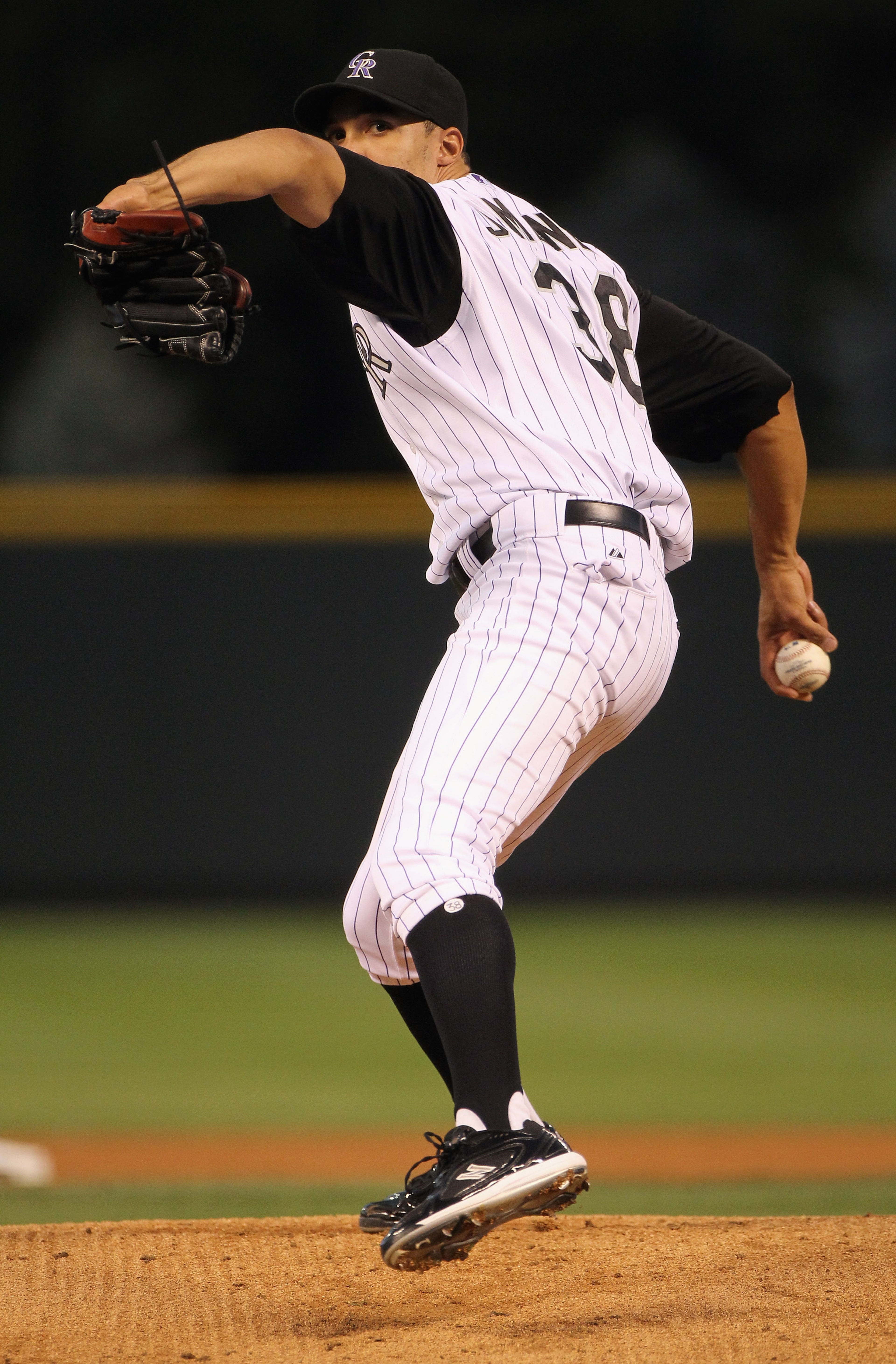 DENVER - SEPTEMBER 27:  Starting pitcher Ubaldo Jimenez #38 of the Colorado Rockies works against the Los Angeles Dodgers at Coors Field on September 25, 2010 in Denver, Colorado. Jiimenez failed to earn his 20th win of the season as the Dodgers defeated