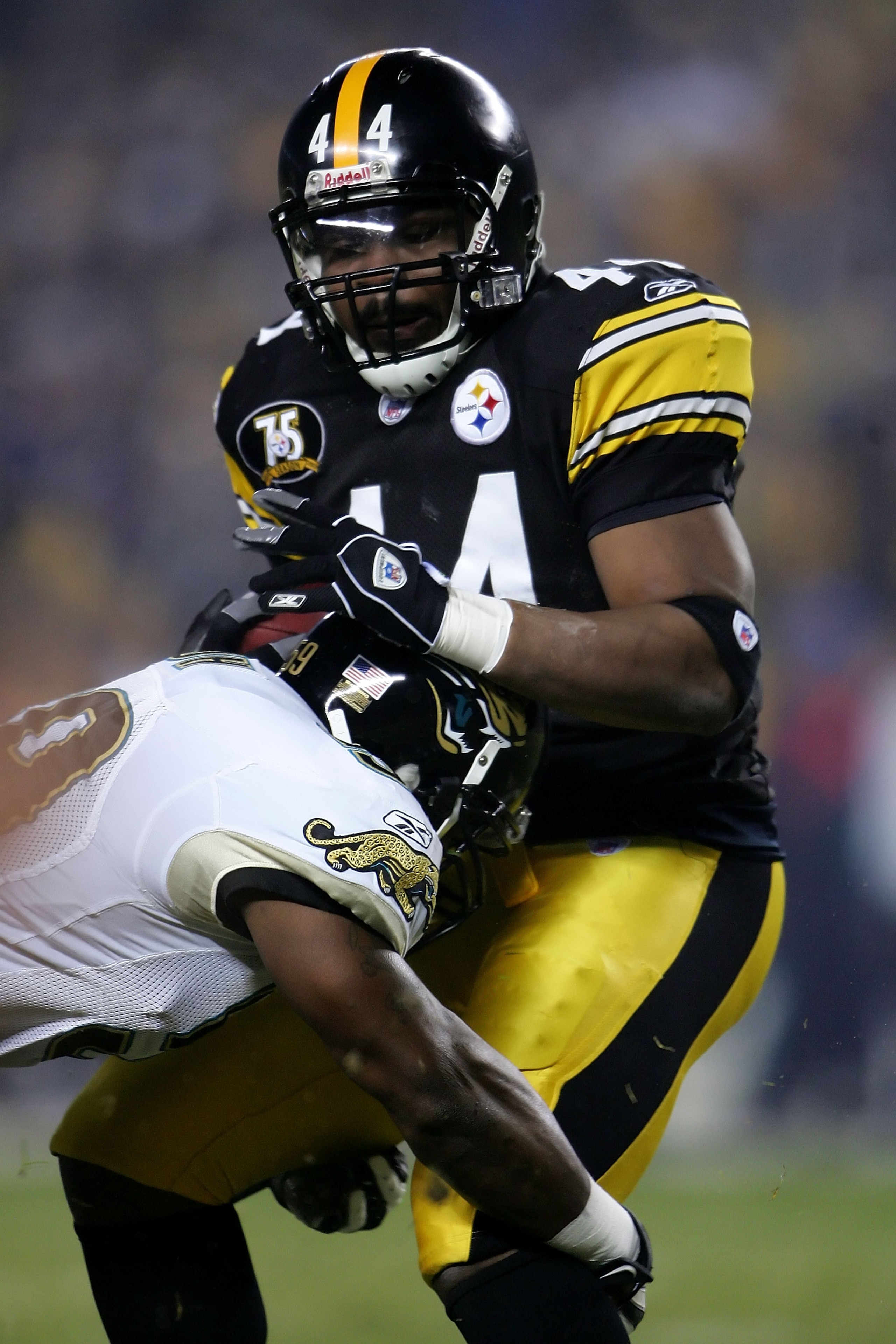 PITTSBURGH - JANUARY 05:  Najeh Davenport #44 of the Pittsburgh Steelers is tackled by Brian Iwuh #59 of the Jacksonville Jaguars in the first quarter of the AFC Wild Card game on January 5, 2008 at Heinz Field in Pittsburgh, Pennsylvania.  (Photo by Chri
