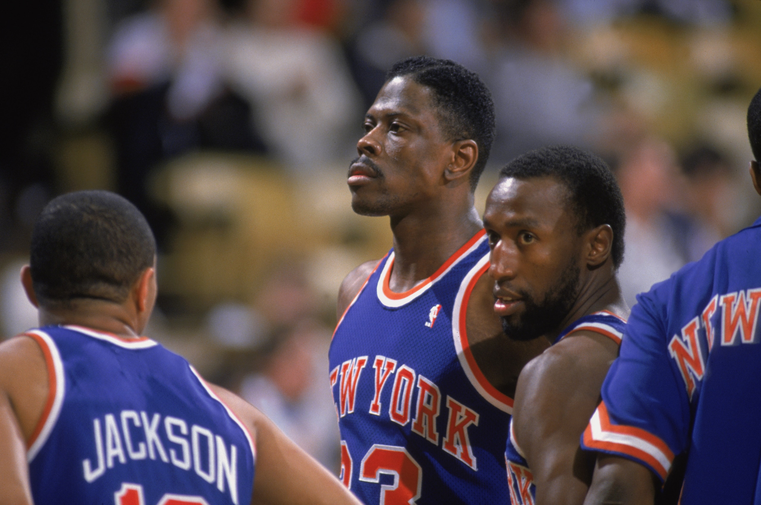 LOS ANGELES - 1987:  Patrick Ewing #33 of the New York Knicks stands with teammates Mark Jackson #13 and Trent Tucker #6 during an NBA game against the Los Angeles Lakers at the Great Western Forum in Los Angeles, California in 1987. (Photo by: Stephen Du