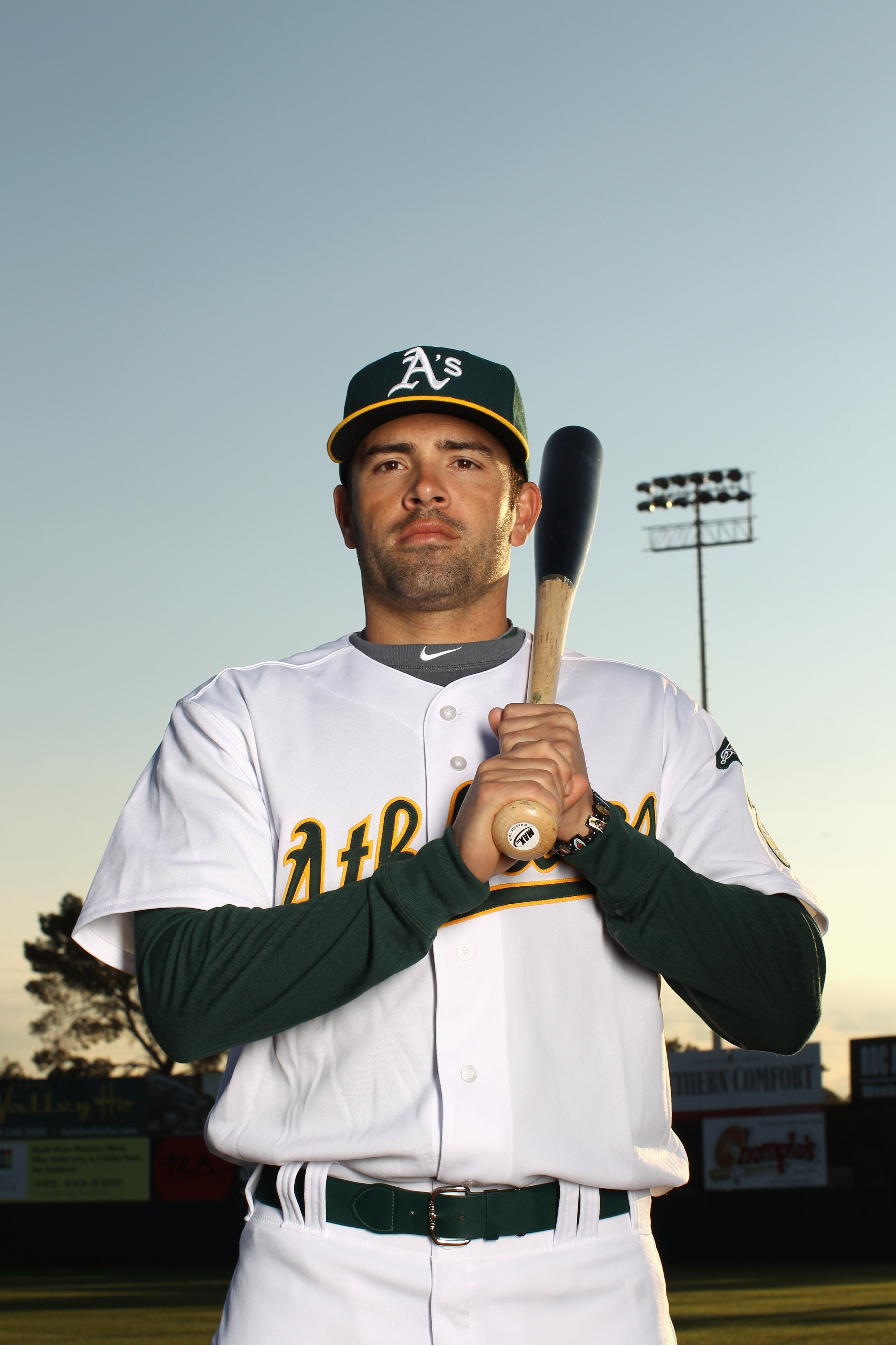 PHOENIX, AZ - FEBRUARY 24:  David DeJesus #12 of the Oakland Athletics poses for a portrait during media photo day at Phoenix Municipal Stadium on February 24, 2011 in Phoenix, Arizona.  (Photo by Ezra Shaw/Getty Images)