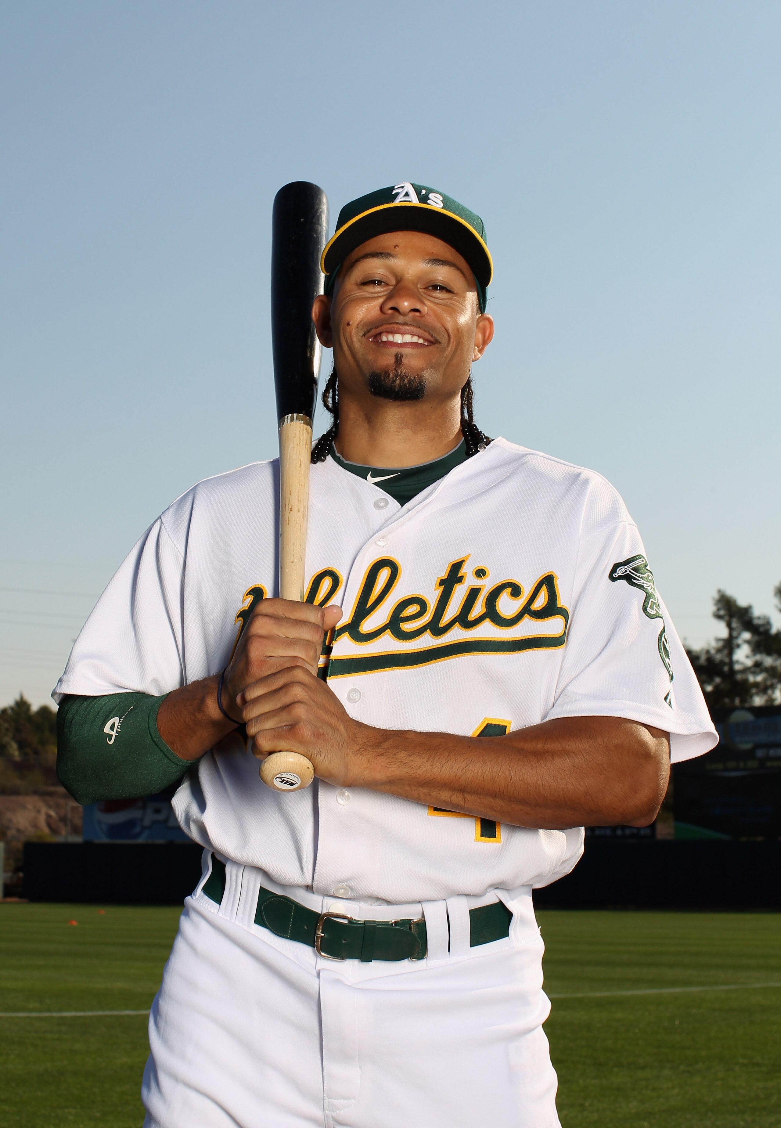 PHOENIX, AZ - FEBRUARY 24:  Coco Crisp #4 of the Oakland Athletics poses for a portrait during media photo day at Phoenix Municipal Stadium on February 24, 2011 in Phoenix, Arizona.  (Photo by Ezra Shaw/Getty Images)