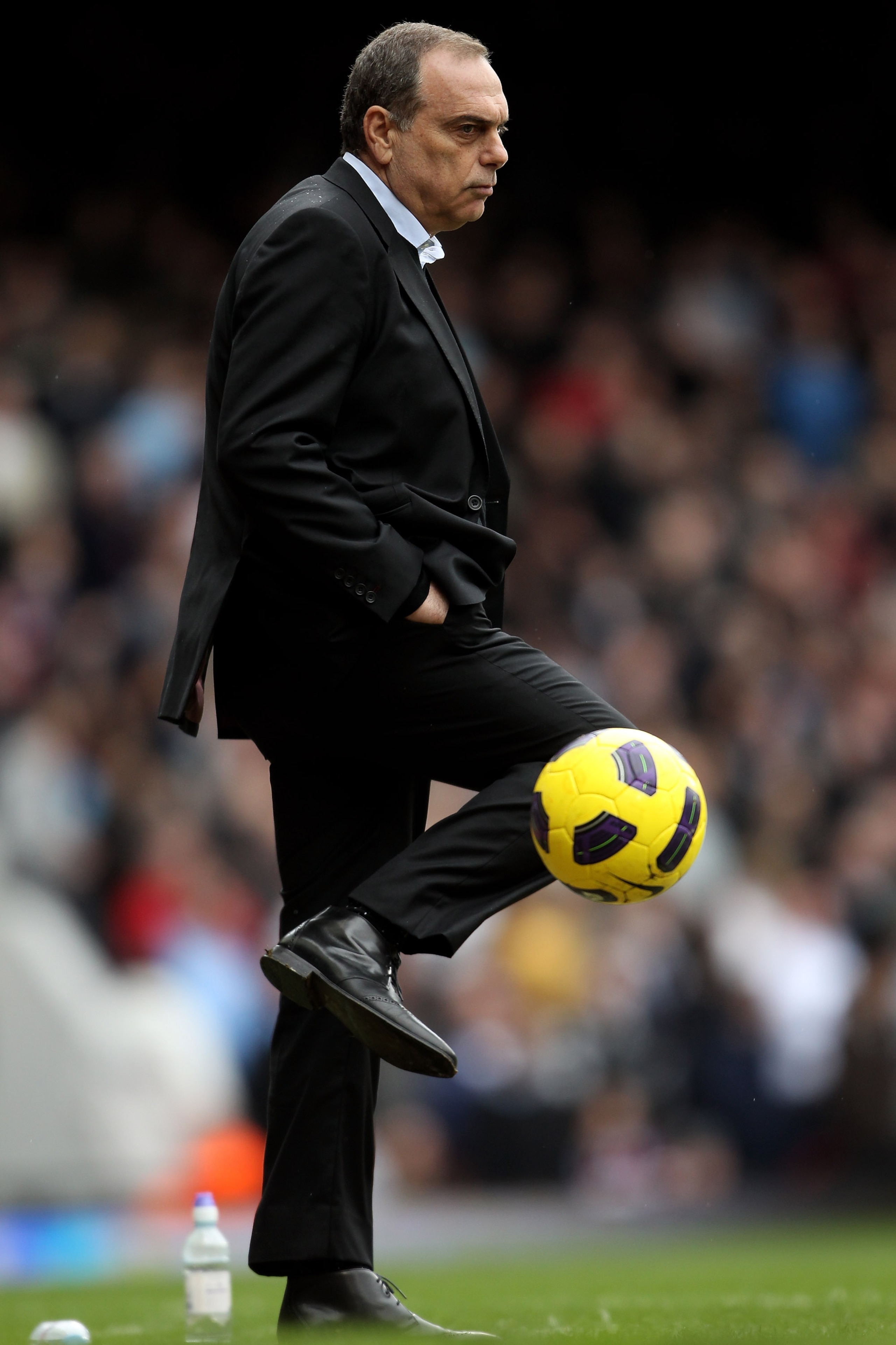 LONDON, ENGLAND - FEBRUARY 27: Avram Grant manager of West Ham kicks the ball during the Barclays Premier League match between West Ham United and Liverpool at the Boleyn Ground on February 27, 2011 in London, England. (Photo by Scott Heavey/Getty Image LONDON, ENGLAND - FEBRUARY 27: Avram Grant manager of West Ham kicks the ball during the Barclays Premier League match between West Ham United and Liverpool at the Boleyn Ground on February 27, 2011 in London, England. (Photo by Scott Heavey/Getty Image