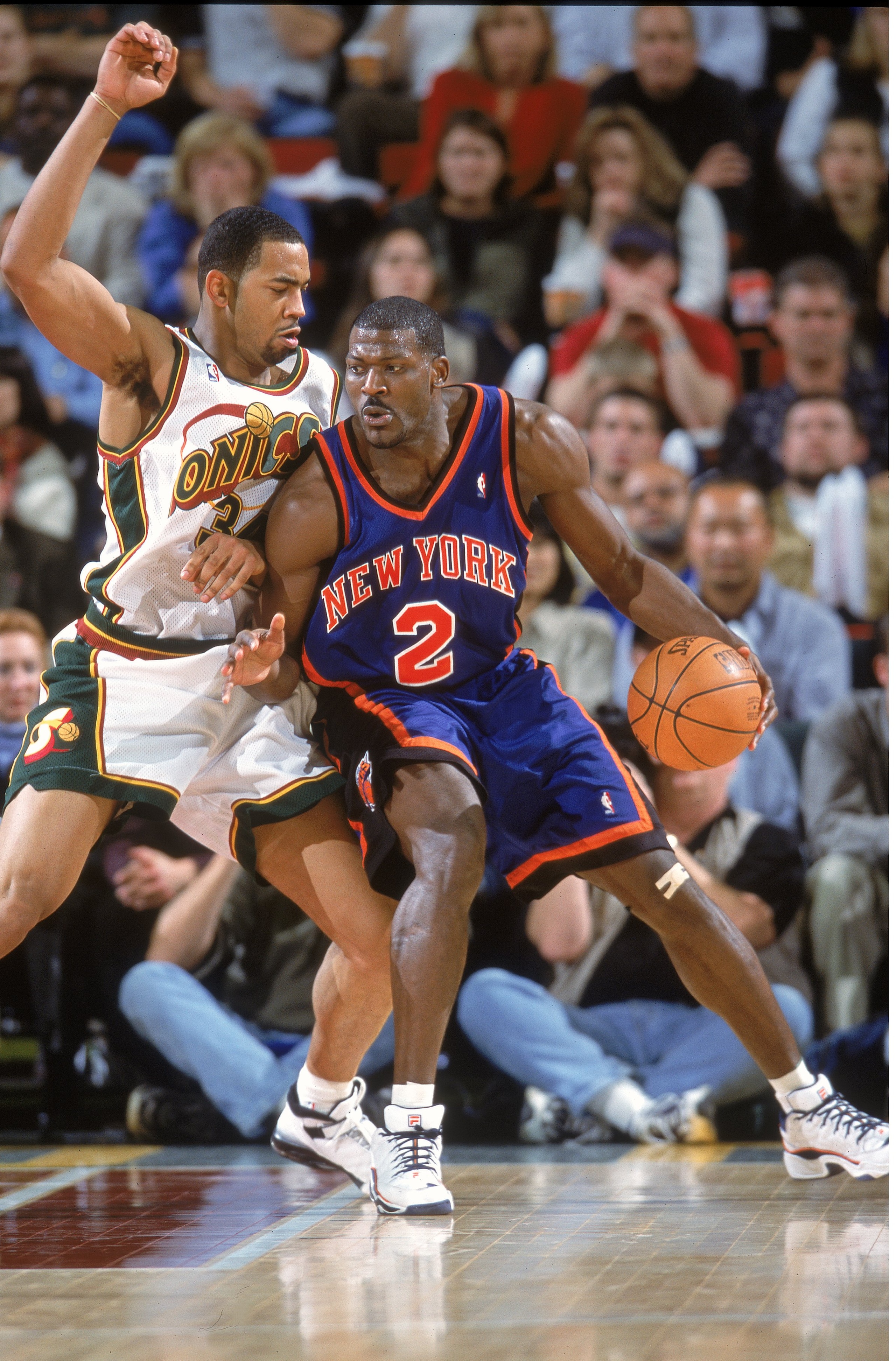14 Nov 2000:  Larry Johnson #2 of the New York Knicks moves with the ball against Jelani McCoy #34 of the Seattle SuperSonics during the gameat Key Arena in Seattle, Washington.  The SuperSonics defeated the Knicks 96-75.   NOTE TO USER: It is expressly u
