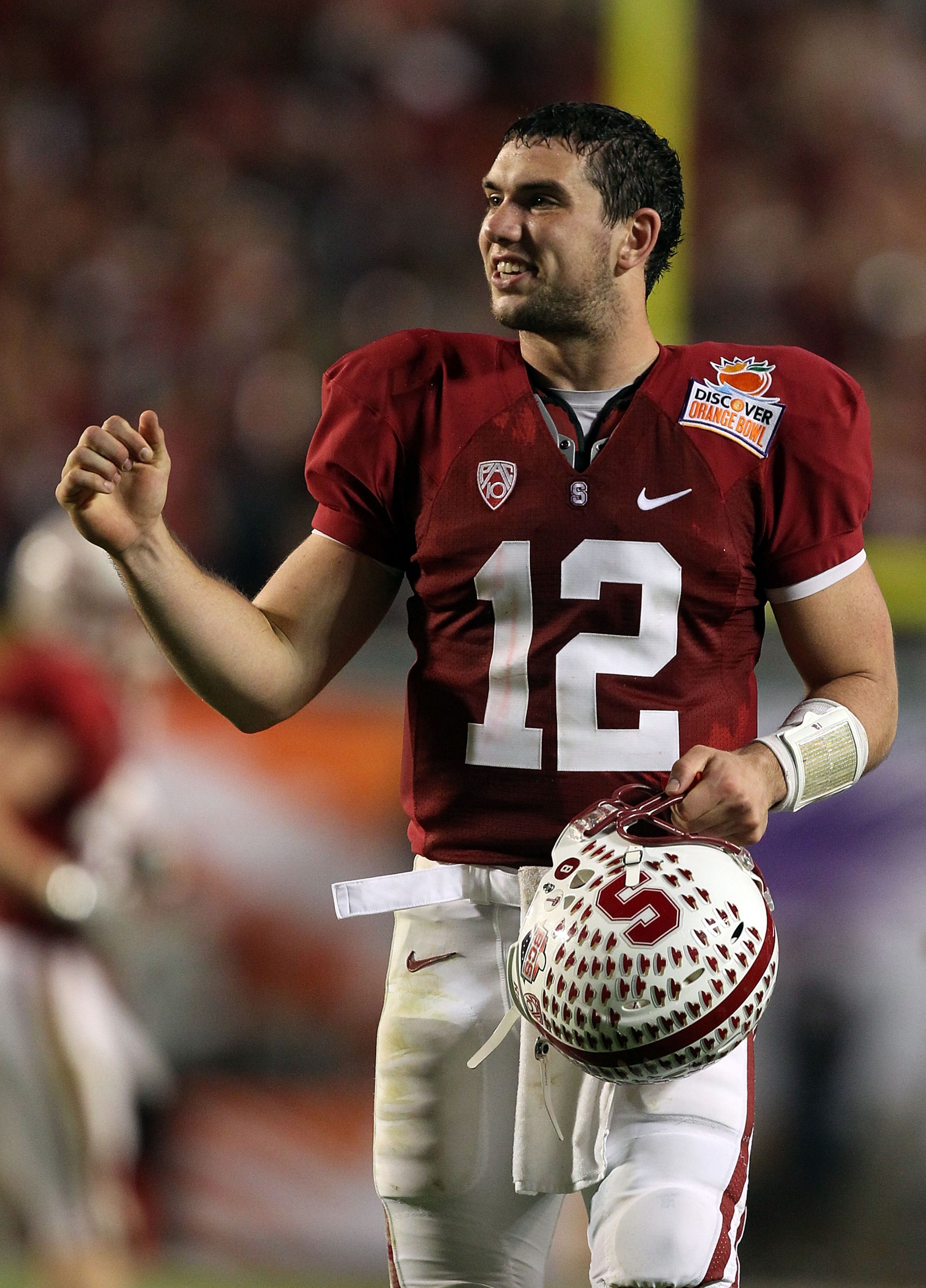 MIAMI, FL - JANUARY 03:  Quarterback Andrew Luck #12 of the Stanford Cardinal celebrates a play against the Virginia Tech Hokies during the 2011 Discover Orange Bowl at Sun Life Stadium on January 3, 2011 in Miami, Florida. Stanford won 40-12. (Photo by S