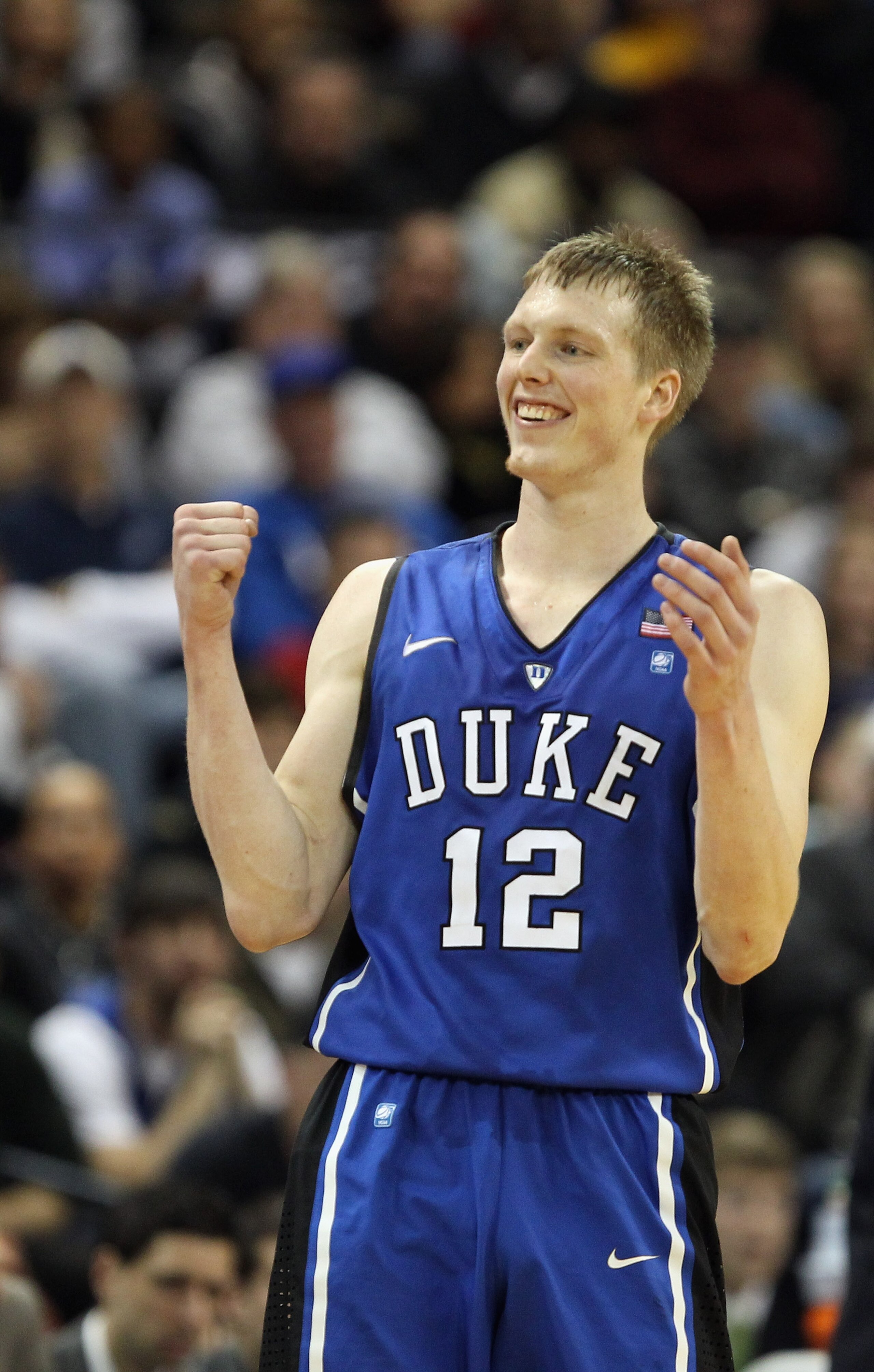 WINSTON SALEM, NC - JANUARY 22:  Kyle Singler #12 of the Duke Blue Devils reacts to a play on the way to defeating the Wake Forest Demon Deacons 83-59 at Lawrence Joel Coliseum on January 22, 2011 in Winston Salem, North Carolina.  (Photo by Streeter Leck