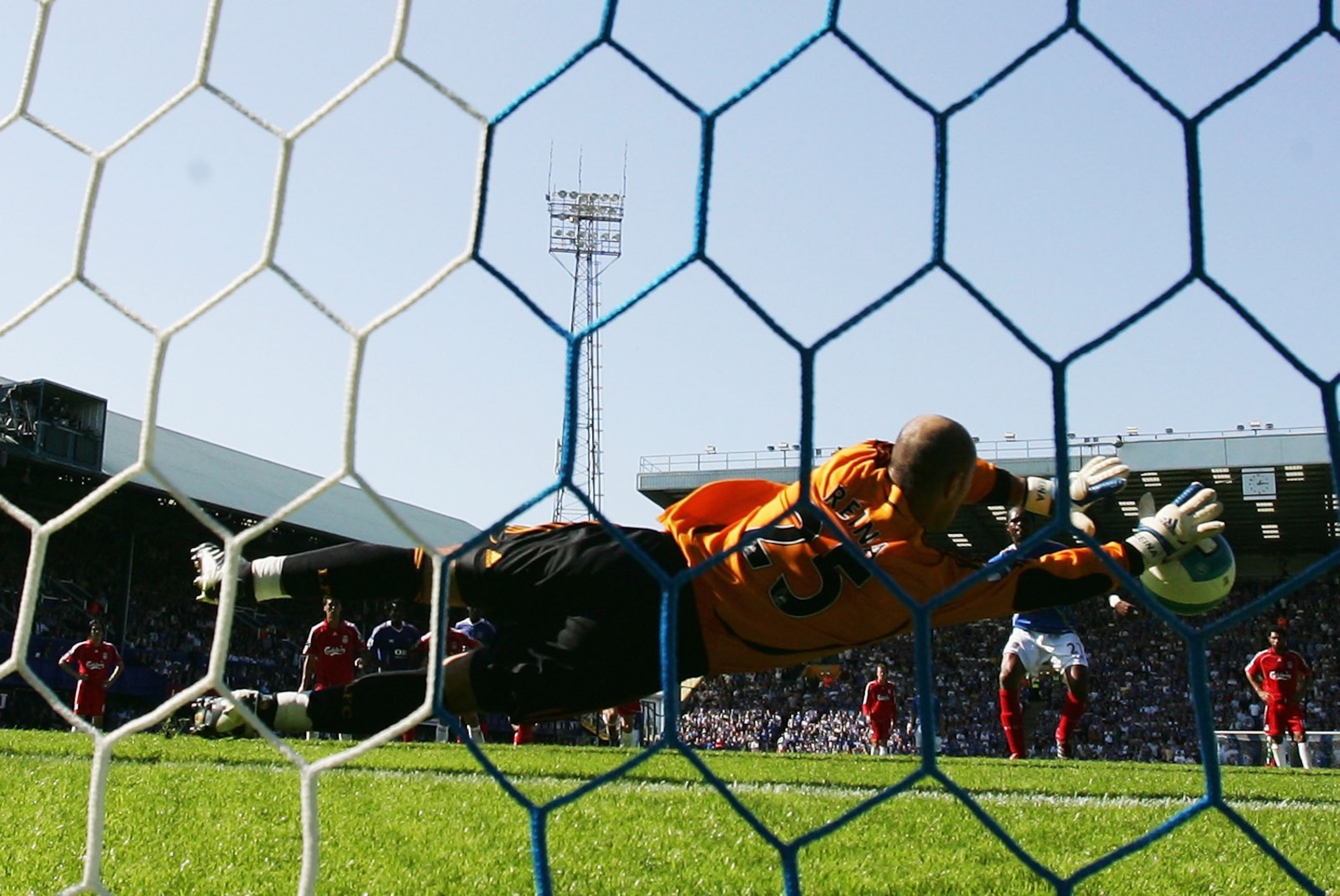 PORTSMOUTH, UNITED KINGDOM - SEPTEMBER 15:  Pepe Reina of Liverpool saves a penalty from Kanu of Portsmouth  during the Barclays Premier League match between Portsmouth and Liverpool at Fratton Park on September 15, 2007 in Portsmouth, England.  (Photo by