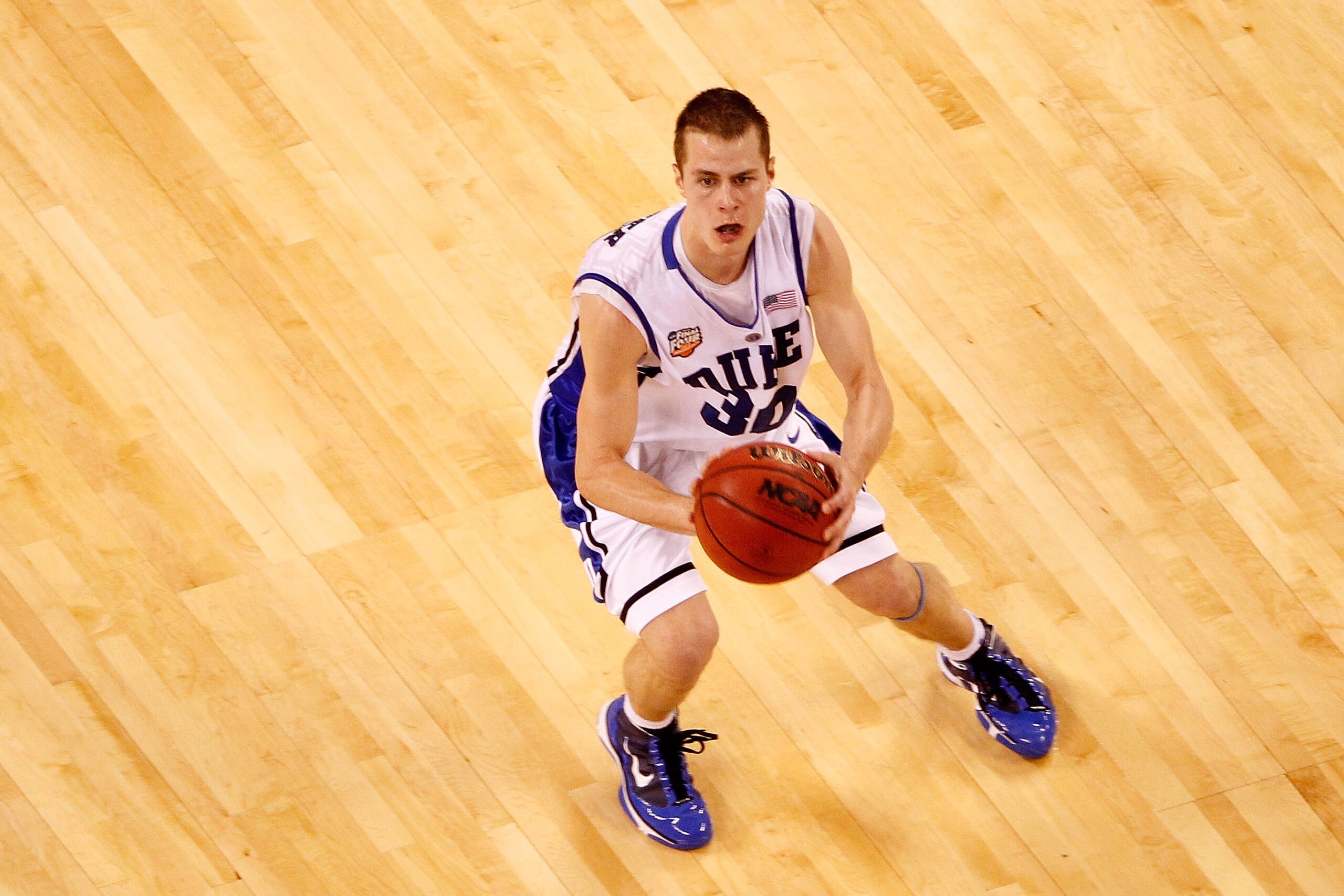 INDIANAPOLIS - APRIL 05:  Jon Scheyer #20 of the Duke Blue Devils gets set to attempt a shot against the Butler Bulldogs during the 2010 NCAA Division I Men's Basketball National Championship game at Lucas Oil Stadium on April 5, 2010 in Indianapolis, Ind