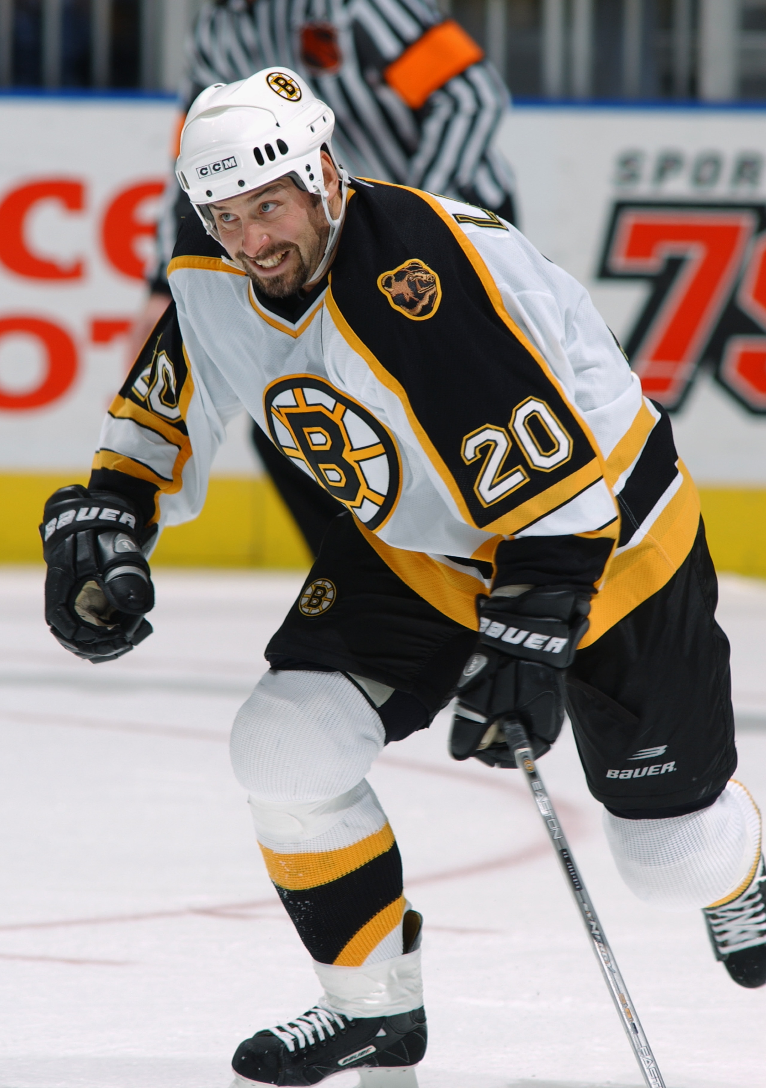 ATLANTA - NOVEMBER 19:  Martin Lapointe #20 of the Boston Bruins skates after the play during the game against the Atlanta Thrashers on November 19, 2003 at Philips Arena in Atlanta, Georgia. The Thrashers defeated the Bruins 5-4. (Photo by Scott Cunningh