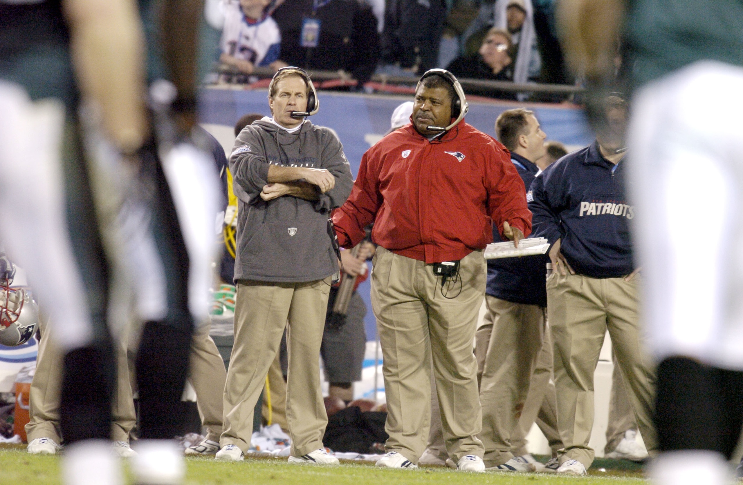 Head Coach of the New England Patriots Bill Belichick on the sidelines with Romeo Crennel - defensive coordinator during the first quarter of Super Bowl XXXIX at Alltel Stadium in Jacksonville, Florida on February 6, 2005. (Photo by Al Messerschmidt/Gett Head Coach of the New England Patriots Bill Belichick on the sidelines with Romeo Crennel - defensive coordinator during the first quarter of Super Bowl XXXIX at Alltel Stadium in Jacksonville, Florida on February 6, 2005. (Photo by Al Messerschmidt/Gett