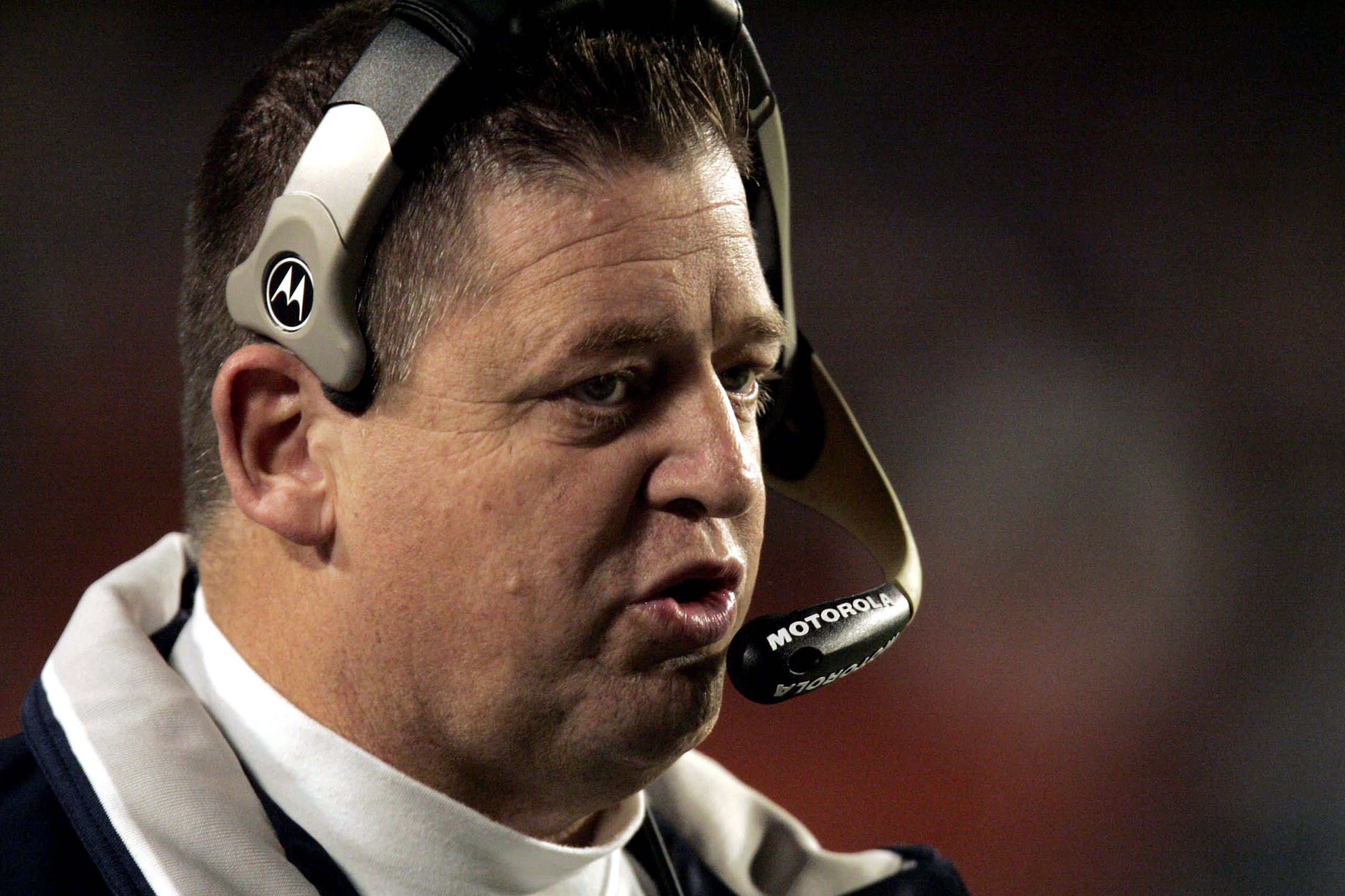 MIAMI - DECEMBER 20: Offensive coordinator Charlie Weis of the New England Patriots stands on the sidelines during the game against the Miami Dolphins on December 20, 2004 at Pro Player Stadium in Miami, Florida. Weis was hired as the head coach at Notre MIAMI - DECEMBER 20: Offensive coordinator Charlie Weis of the New England Patriots stands on the sidelines during the game against the Miami Dolphins on December 20, 2004 at Pro Player Stadium in Miami, Florida. Weis was hired as the head coach at Notre