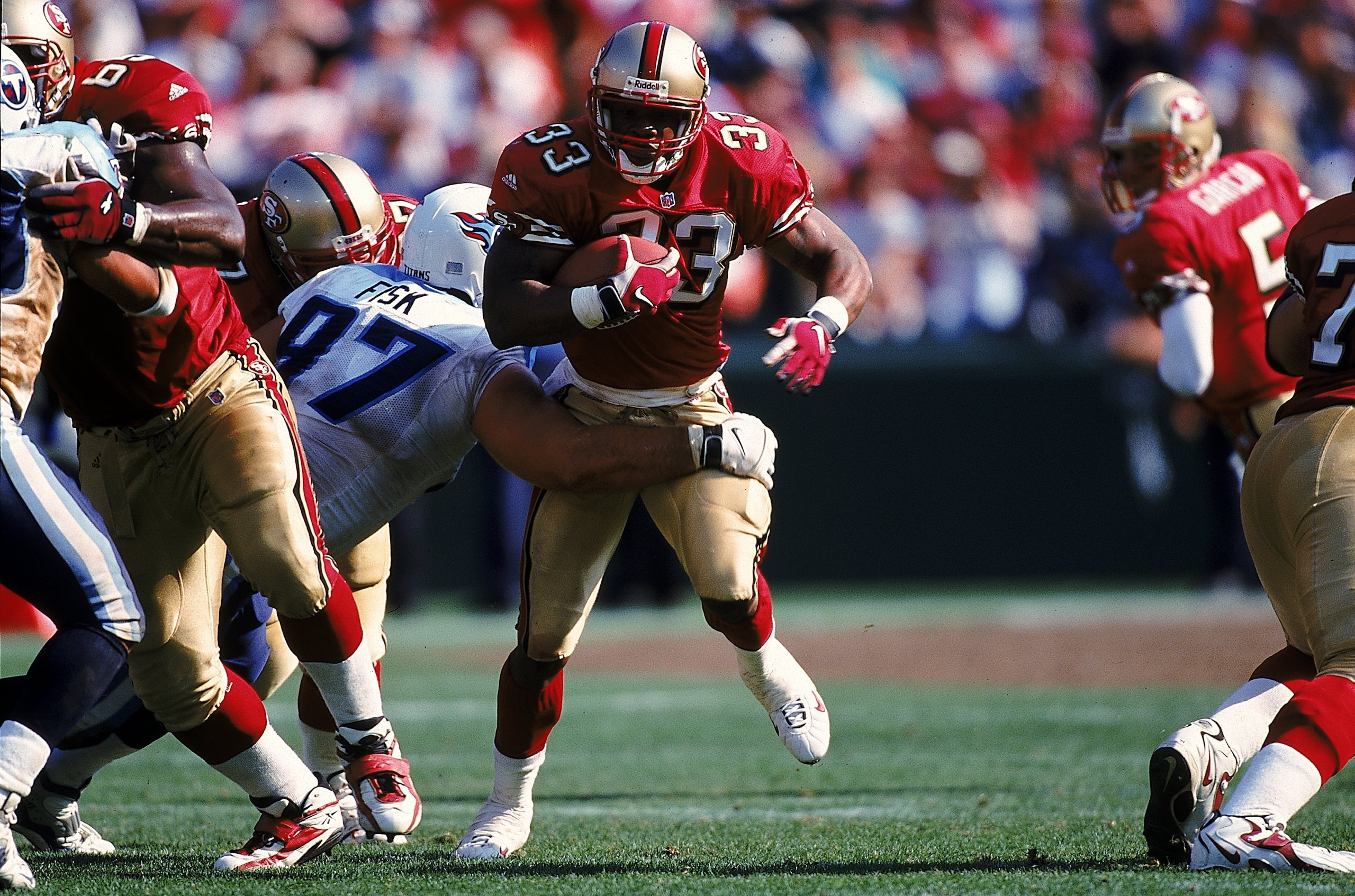 3 Oct 1999: Lawrence Phillips #33 of the San Francisco 49ers carries the ball during a game against the Tennessee Titans at 3Com Park in San Francisco, California. The 49ers defeated the Titans 24-22.