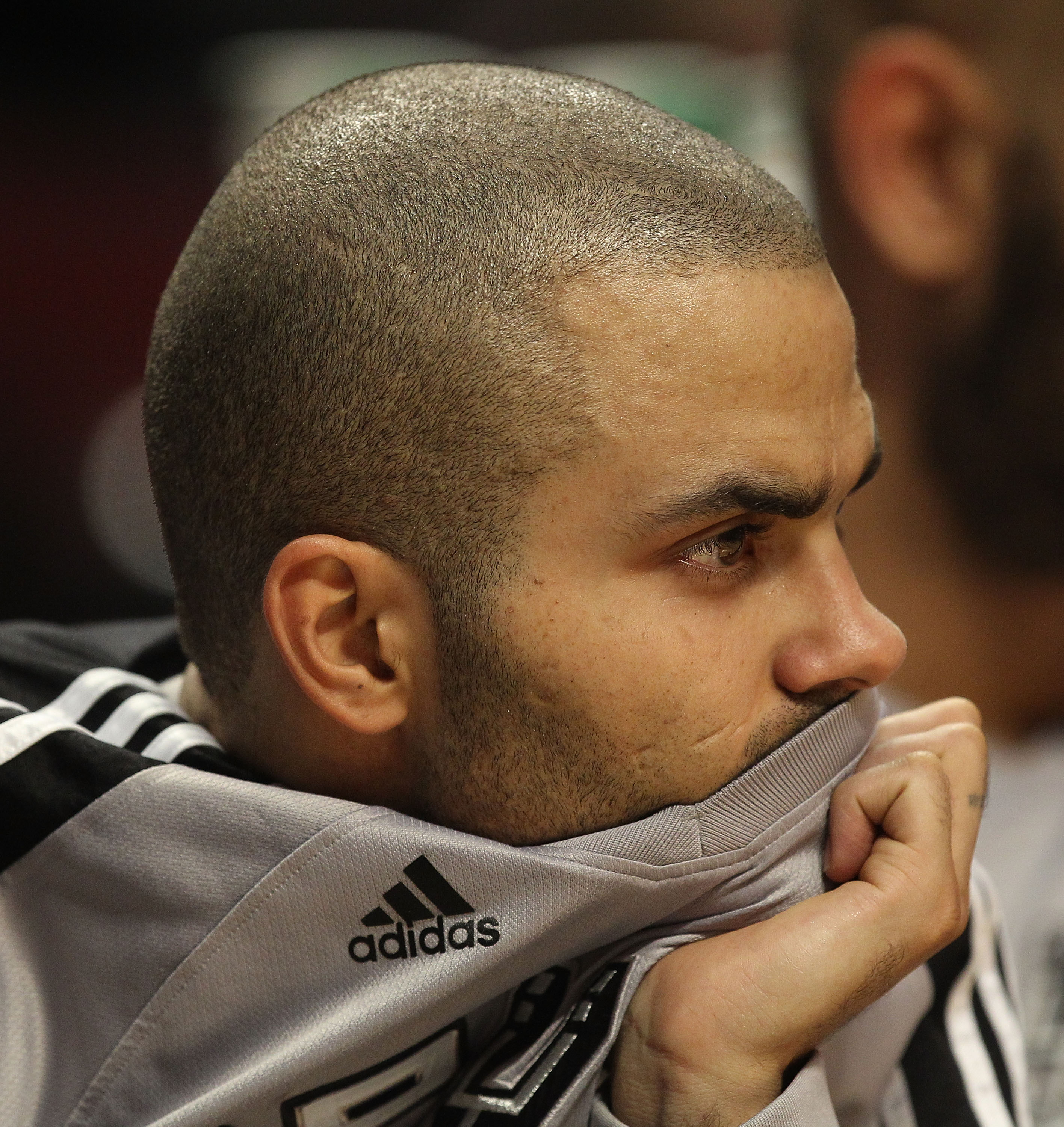CHICAGO, IL - FEBRUARY 17: Tony Parker #9 of the San Antonio Spurs sits on the bench watching his teammates take on the Chicago Bulls at the United Center on February 17, 2011 in Chicago, Illinois. The Bulls defeated the Spurs 109-99. NOTE TO USER: User e