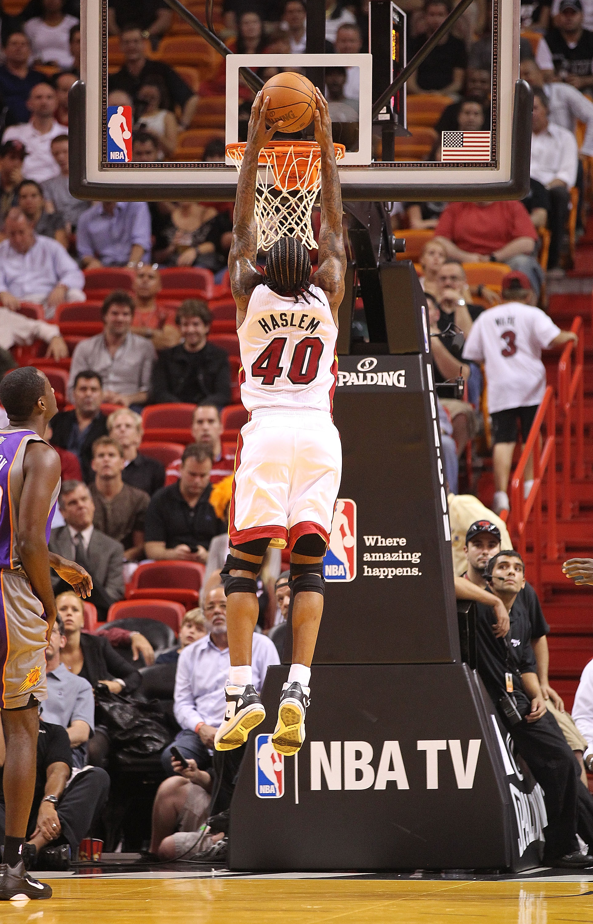 MIAMI - NOVEMBER 17: Udonis Haslem #40 of the Miami Heat dunks during a game against the Phoenix Suns at American Airlines Arena on November 17, 2010 in Miami, Florida. NOTE TO USER: User expressly acknowledges and agrees that, by downloading and/or using