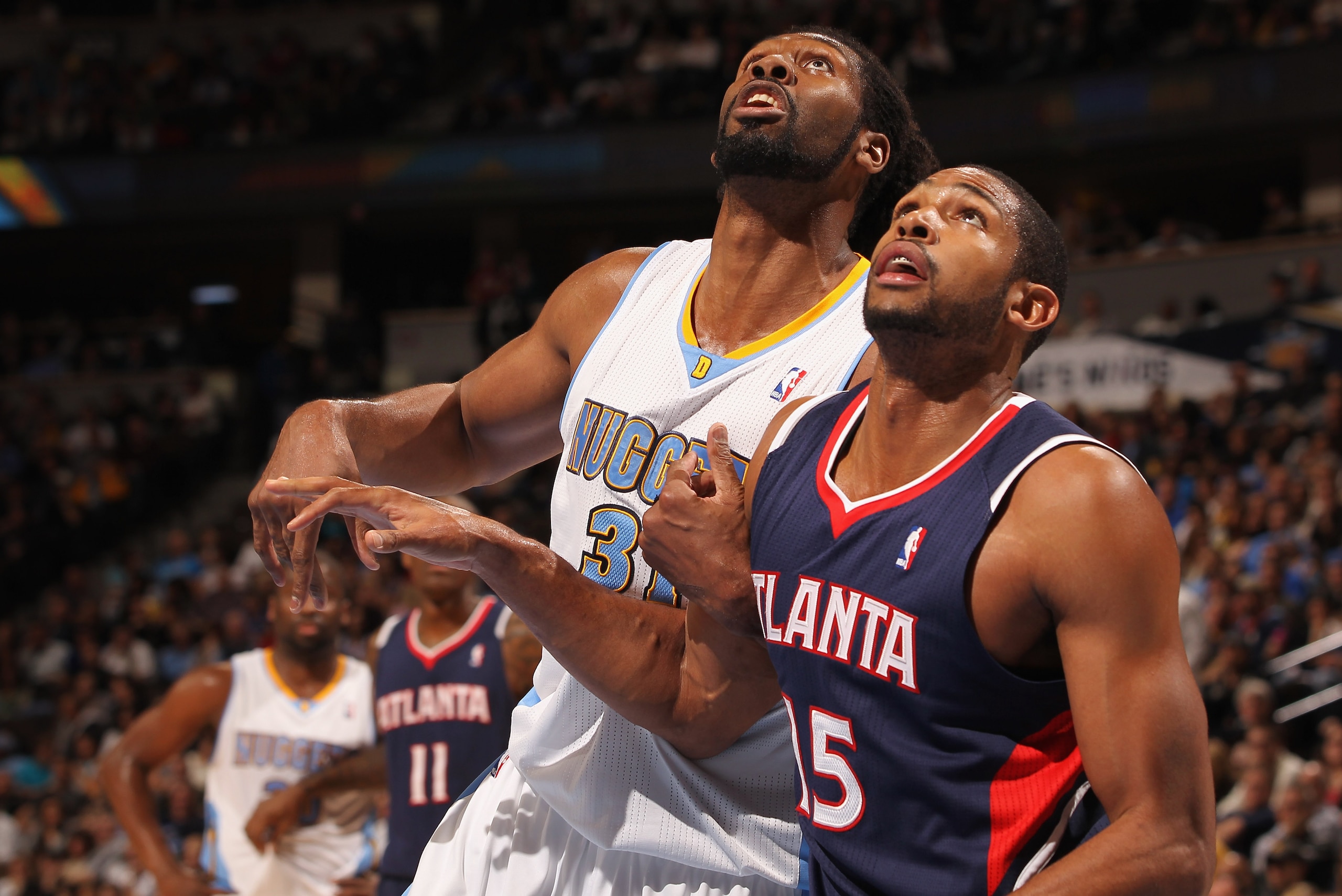 DENVER, CO - FEBRUARY 28: Nene #31 of the Denver Nuggets battles for position with Al Horford #15 of the Atlanta Hawks during NBA action at the Pepsi Center on February 28, 2011 in Denver, Colorado. The Nuggets deafeated the Hawks 100-90. NOTE TO USER: U DENVER, CO - FEBRUARY 28: Nene #31 of the Denver Nuggets battles for position with Al Horford #15 of the Atlanta Hawks during NBA action at the Pepsi Center on February 28, 2011 in Denver, Colorado. The Nuggets deafeated the Hawks 100-90. NOTE TO USER: U