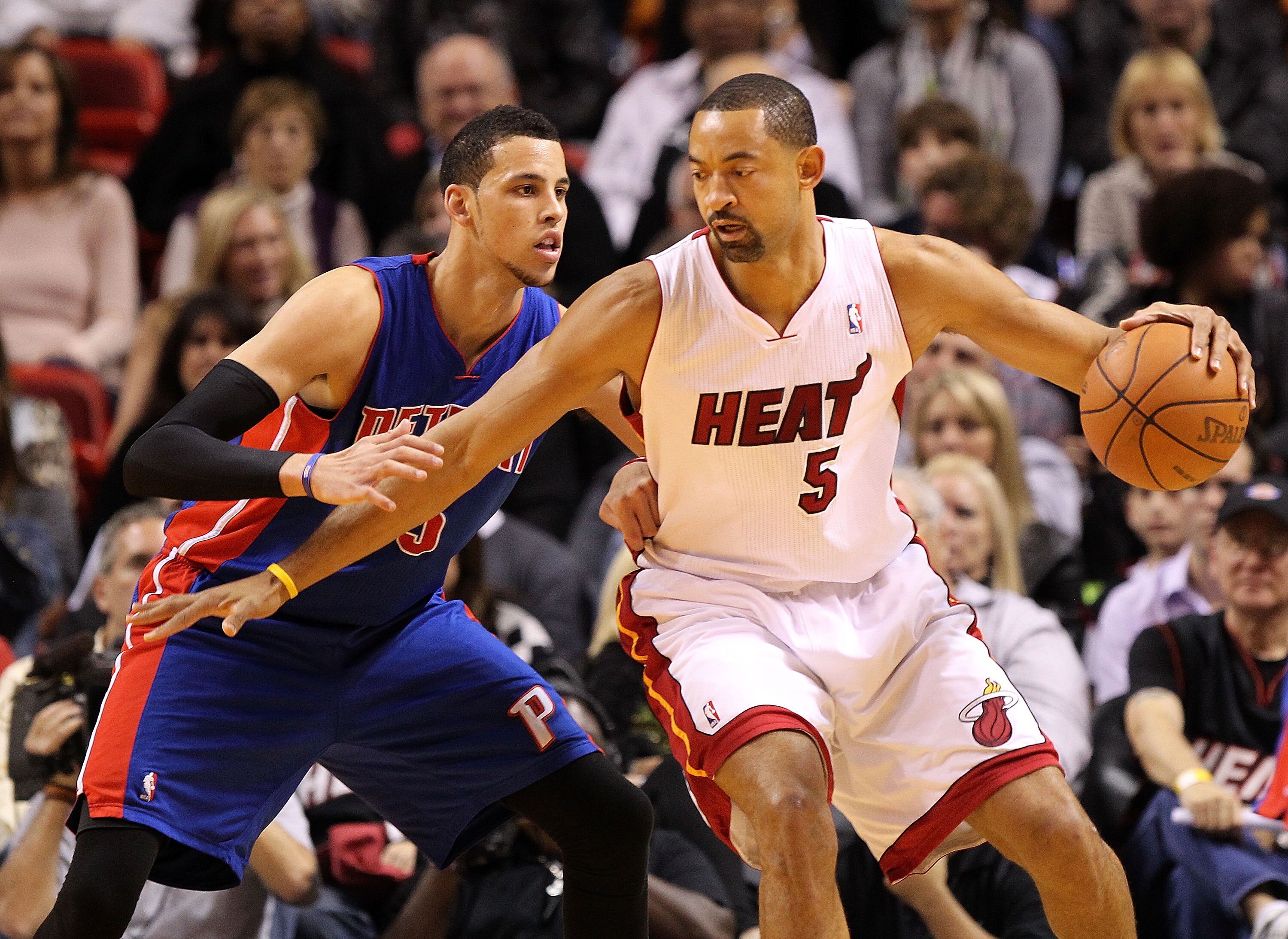 MIAMI, FL - JANUARY 28:  Juwan Howard #5 of the Miami Heat posts up Austin Daye #5 of the Detroit Pistons during a game at American Airlines Arena on January 28, 2011 in Miami, Florida. NOTE TO USER: User expressly acknowledges and agrees that, by downloa
