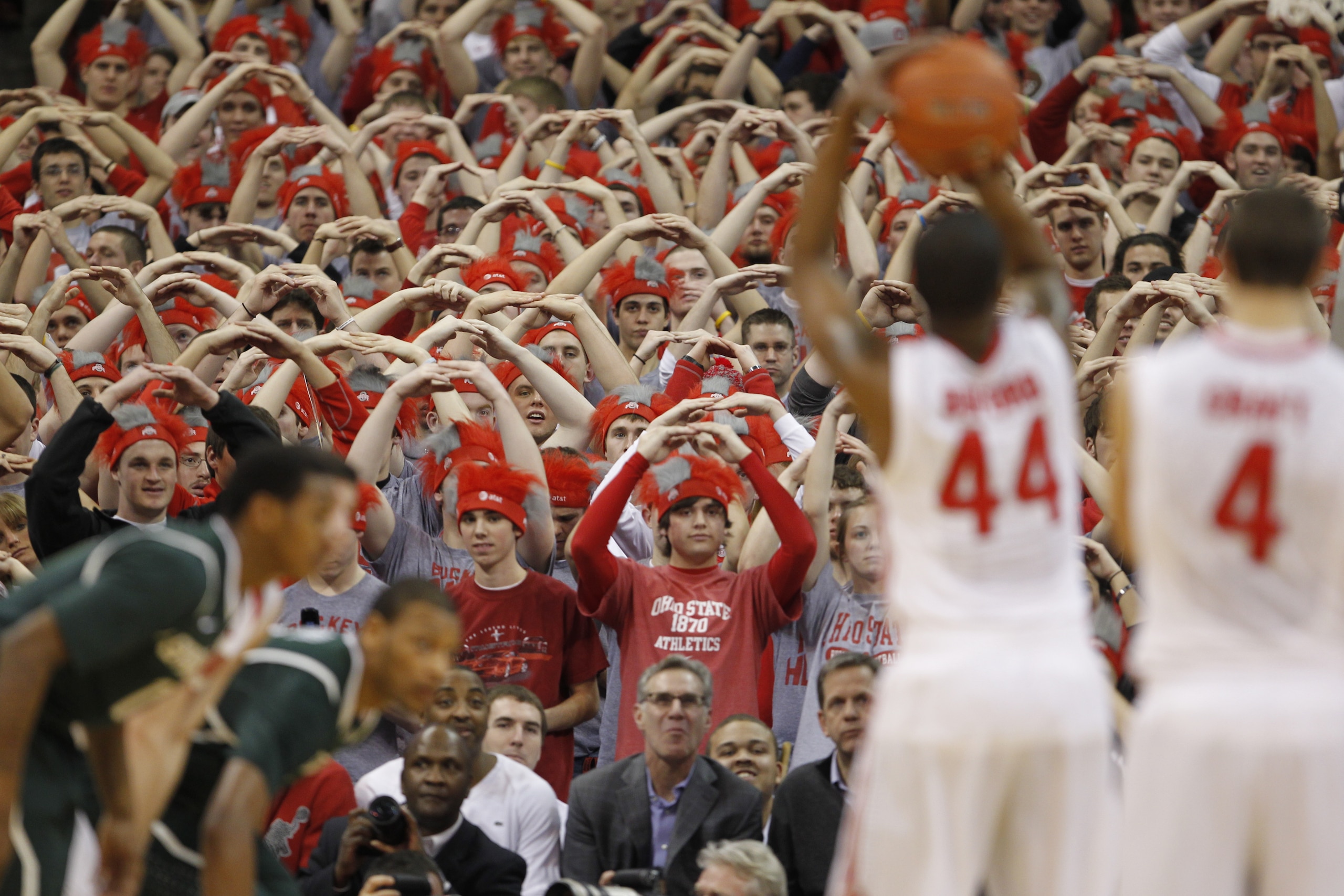 COLUMBUS, OH - FEBRUARY 15:  Fans react while William Buford #44 of the Ohio State Buckeyes shoots a free throw while playing the Michigan State Spartans on February 15, 2011 at Value City Arena in Columbus, Ohio.  (Photo by Gregory Shamus/Getty Images)