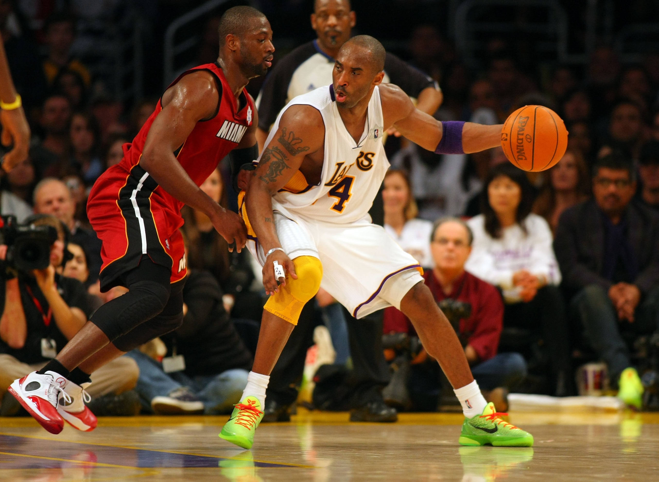 LOS ANGELES, CA - DECEMBER 25:  Kobe Bryant #24 of the Los Angeles Lakers dribbles to the basket against Dwyane Wade #3 of the Miami Heat during the NBA game at Staples Center on December 25, 2010 in Los Angeles, California. NOTE TO USER: User expressly a