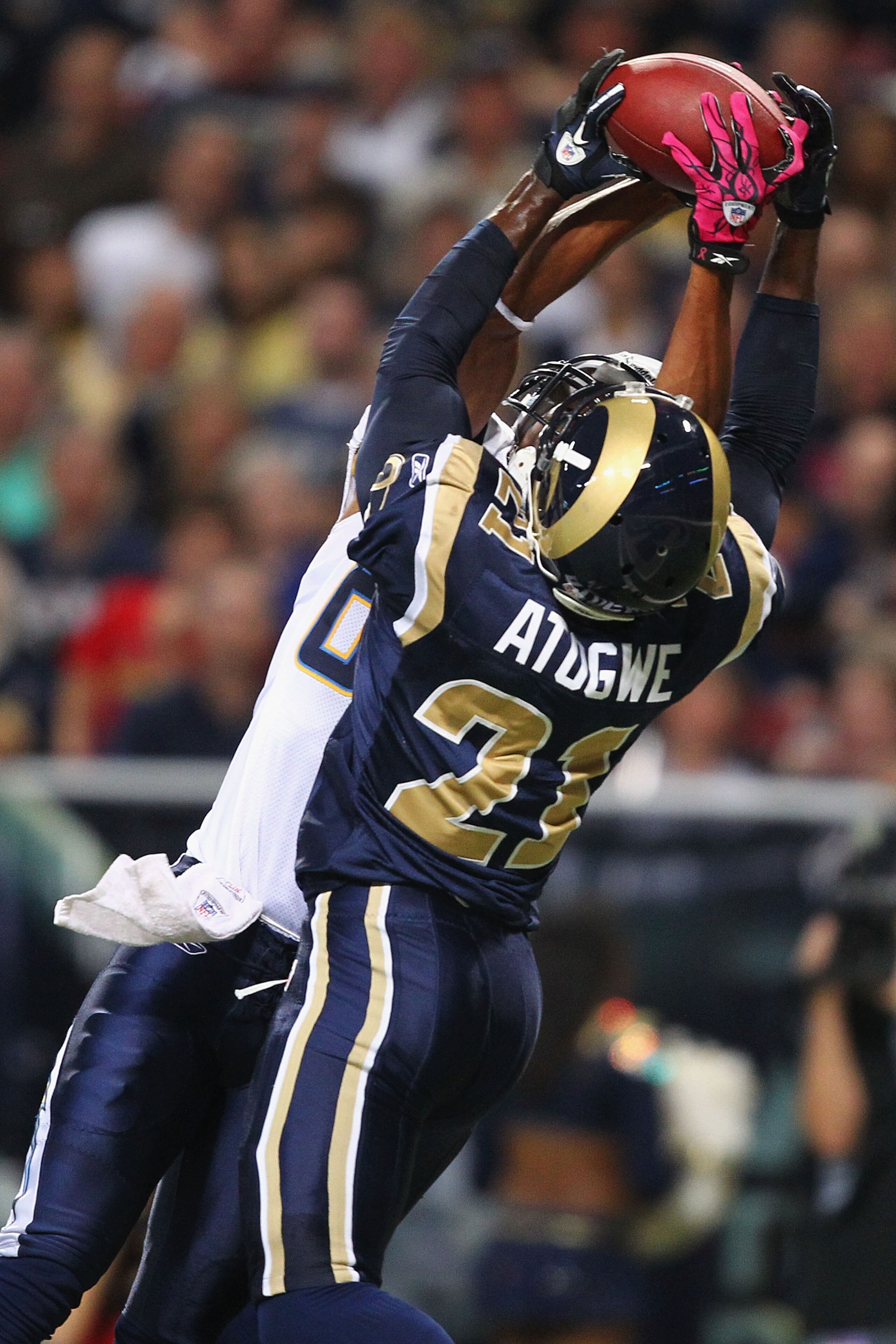 ST. LOUIS - OCTOBER 17: Oshiomogho Atogwe #21 of the St. Louis Rams intercepts a pass against the San Diego Chargers at the Edward Jones Dome on October 17, 2010 in St. Louis, Missouri. The Rams beat the Chargers 20-17. (Photo by Dilip Vishwanat/Getty I ST. LOUIS - OCTOBER 17: Oshiomogho Atogwe #21 of the St. Louis Rams intercepts a pass against the San Diego Chargers at the Edward Jones Dome on October 17, 2010 in St. Louis, Missouri. The Rams beat the Chargers 20-17. (Photo by Dilip Vishwanat/Getty I