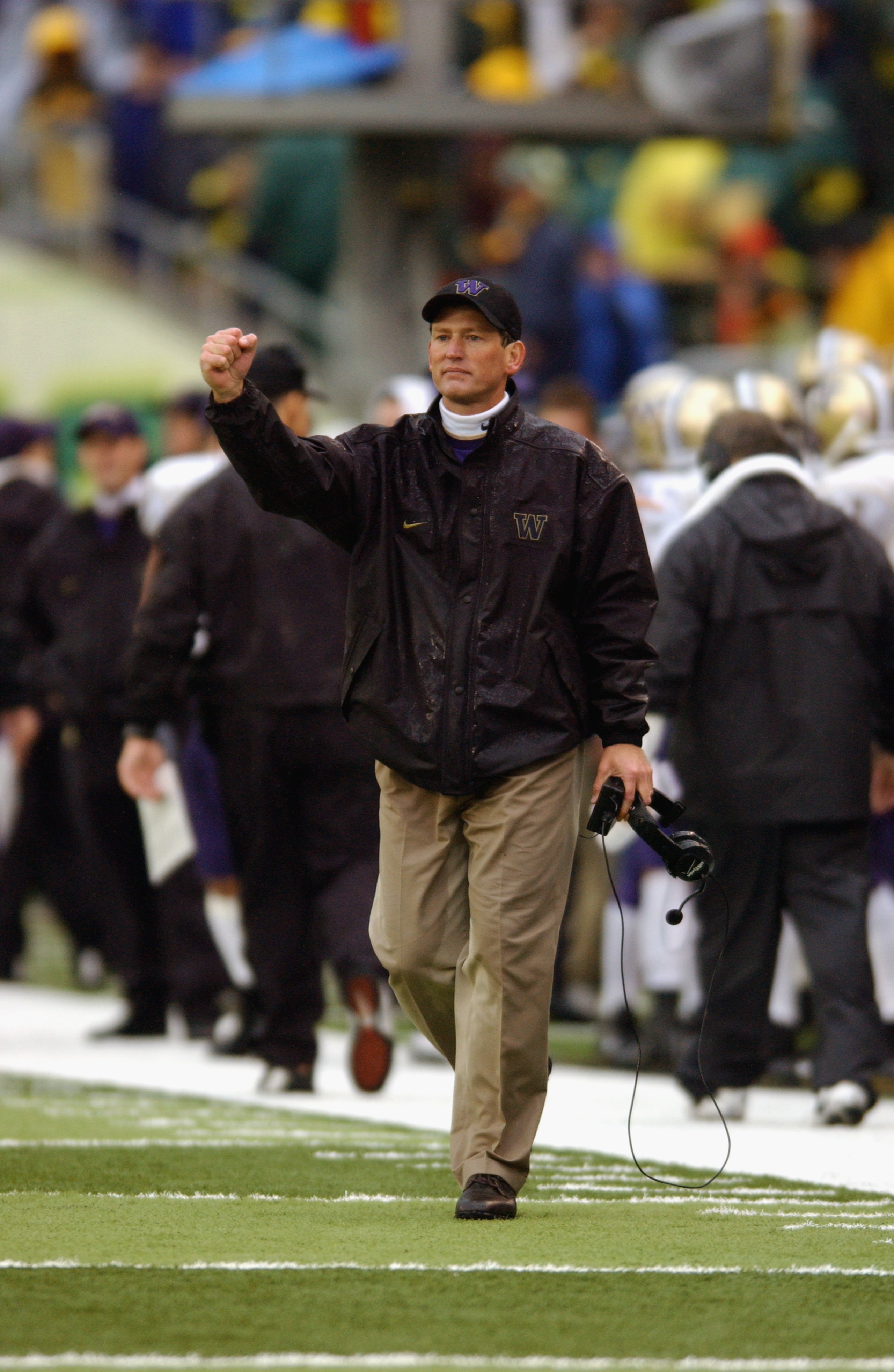 EUGENE, OR - NOVEMBER 16:  Head coach Rick Neuheisel of the Washington Huskies celebrates during the game against the Oregon Ducks on November 16, 2002 at Autzen Stadium in Eugene Oregon. The Huskies won 42-14. (Photo by Otto Greule Jr/Getty Images)