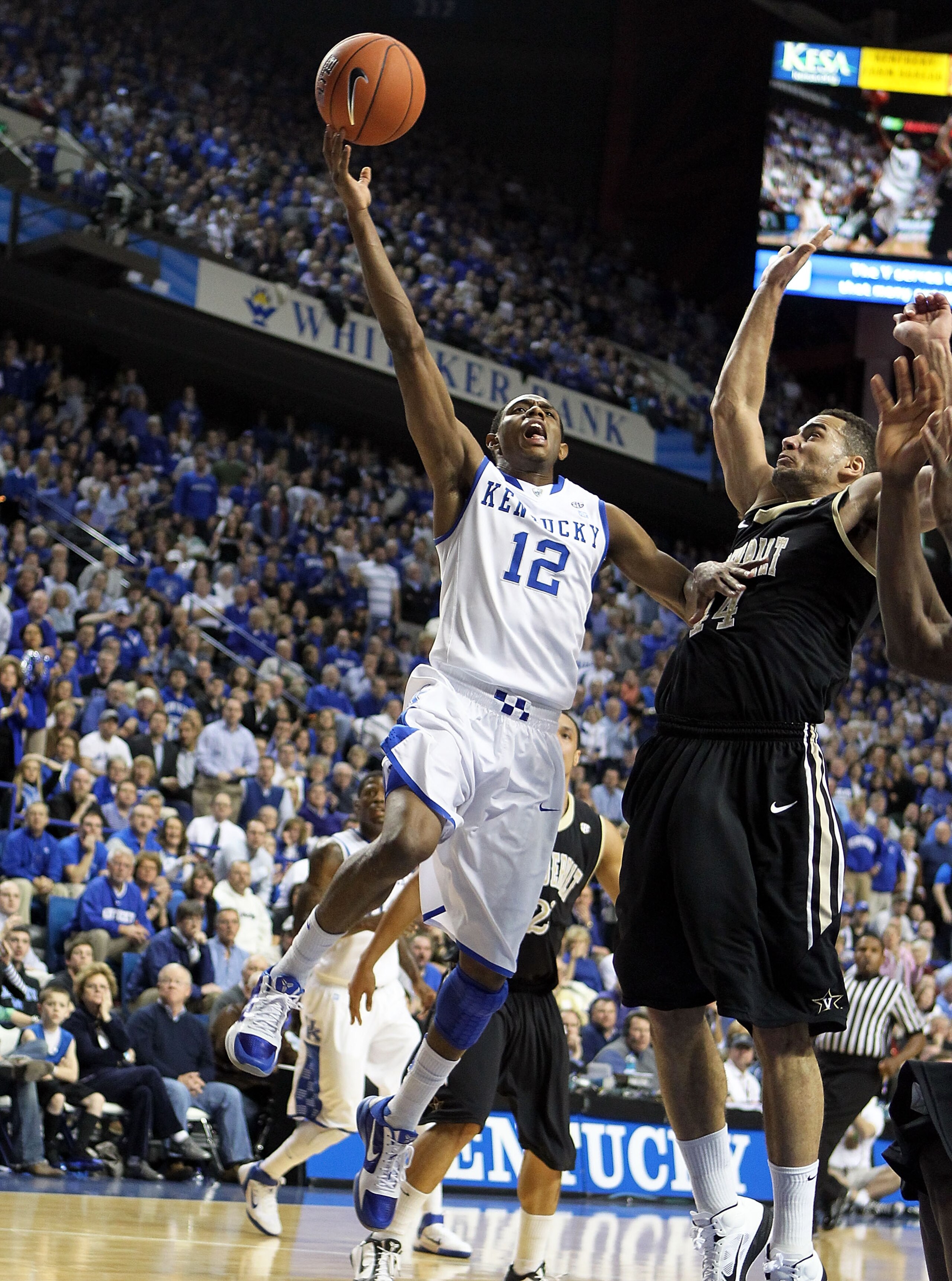 LEXINGTON, KY - MARCH 01:  Brandon Knight #12 of the Kentucky Wildcats shoots the ball while defended by Jeffery Taylor #44 of the Vanderbilt Commodores  during the Kentucky 68-66 win in the SEC game at Rupp Arena on March 1, 2011 in Lexington, Kentucky.