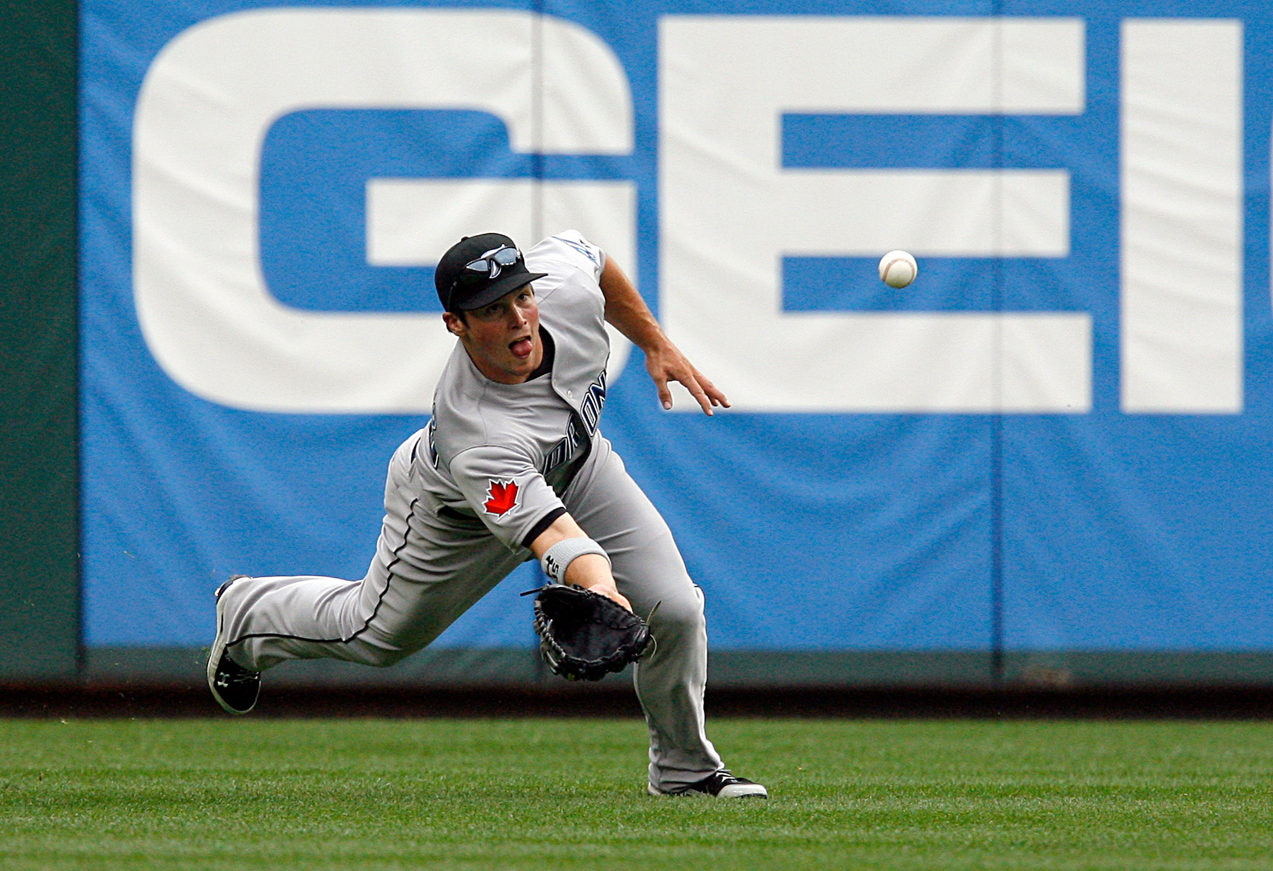 ARLINGTON, TX - APRIL 05: Left fielder Travis Snider #45 of the Toronto Blue Jays makes the catch for the out in the bottom of the second inning against the Texas Rangers on Opening Day at Rangers Ballpark on April 5, 2010 in Arlington, Texas. (Photo by T