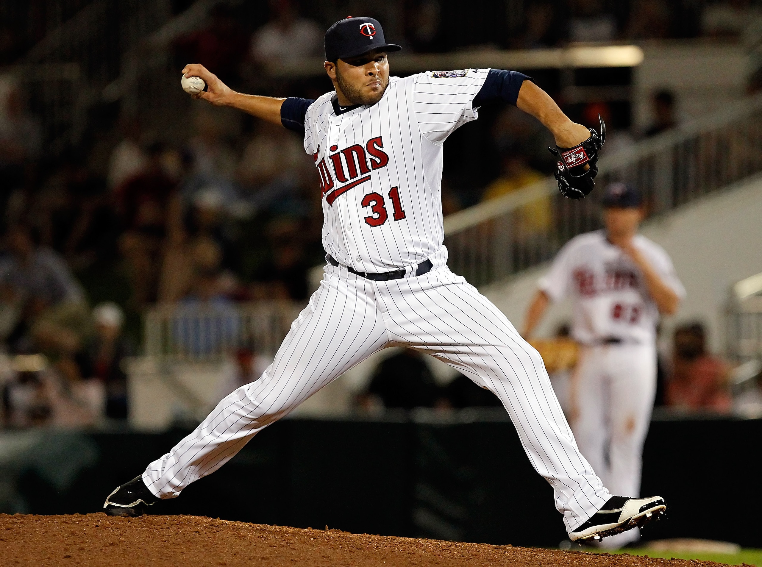 FORT MYERS, FL - FEBRUARY 27:  Pitcher Alex Burnett #31 of the Minnesota Twins pitches against the Boston Red Sox during a Grapefruit League Spring Training Game at Hammond Stadium on February 27, 2011 in Fort Myers, Florida.  (Photo by J. Meric/Getty Ima