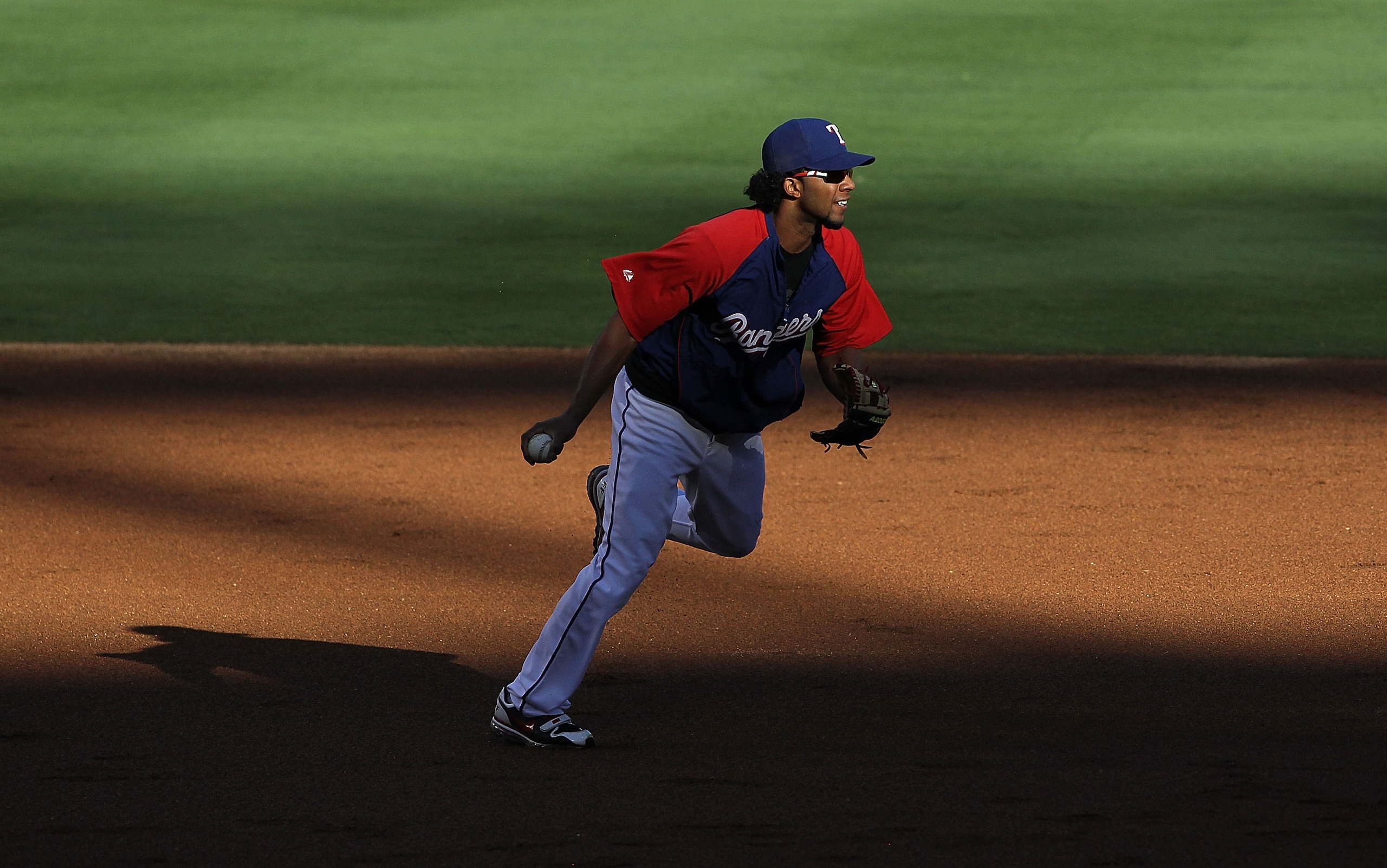 ARLINGTON, TX - OCTOBER 29:  Elvis Andrus #1 of the Texas Rangers during a team workout for the 2010 World Series at Rangers Ballpark in Arlington on October 29, 2010 in Arlington, Texas.  (Photo by Ronald Martinez/Getty Images)
