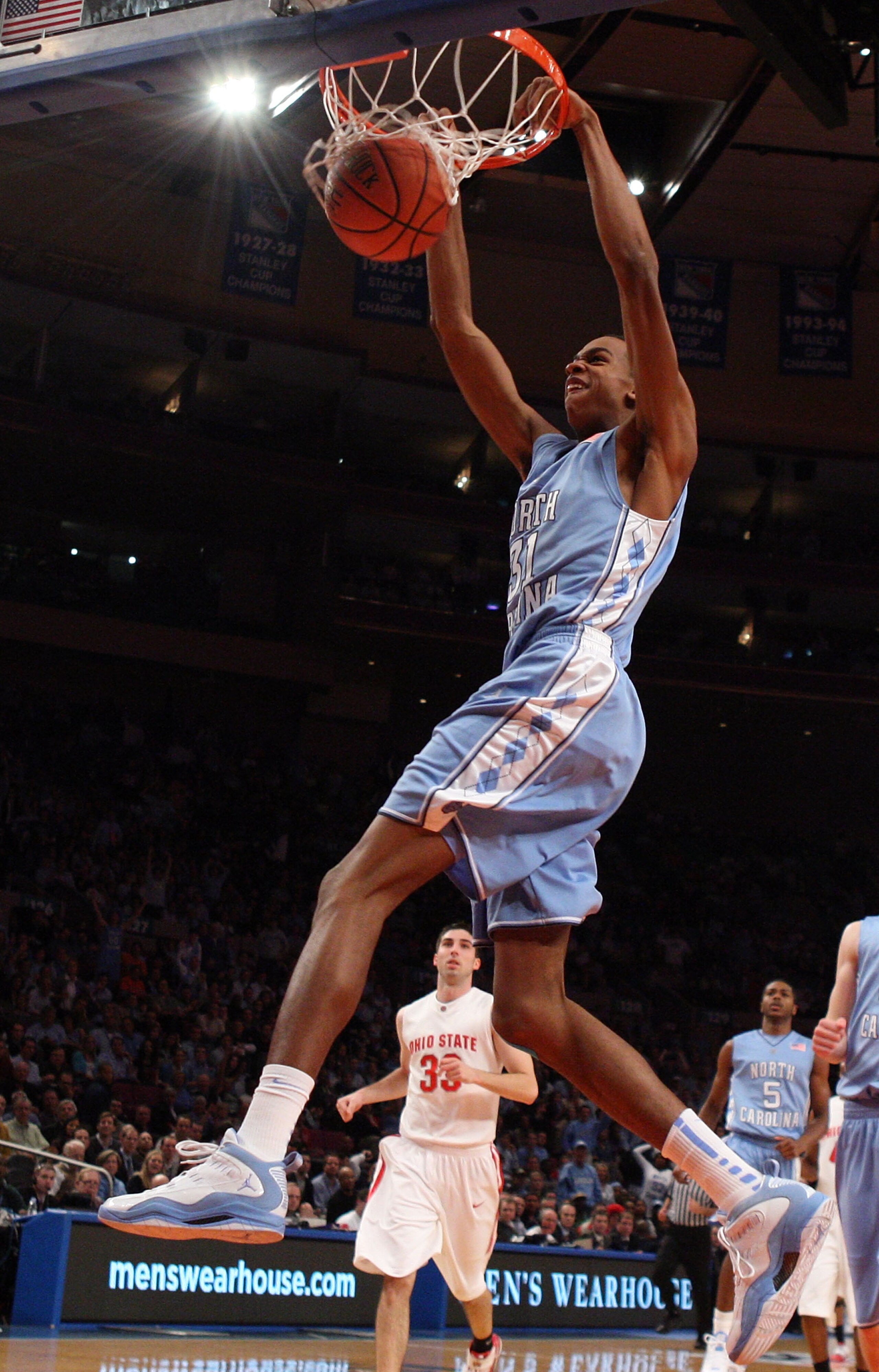 NEW YORK - NOVEMBER 19: John Henson #31 of the North Carolina Tar Heels dunks against the Ohio State Buckeyes during their semifinal game of the 2K Sports Classic on November 19, 2009 at Madison Square Garden in New York City. (Photo by Jim McIsaac/Get NEW YORK - NOVEMBER 19: John Henson #31 of the North Carolina Tar Heels dunks against the Ohio State Buckeyes during their semifinal game of the 2K Sports Classic on November 19, 2009 at Madison Square Garden in New York City. (Photo by Jim McIsaac/Get