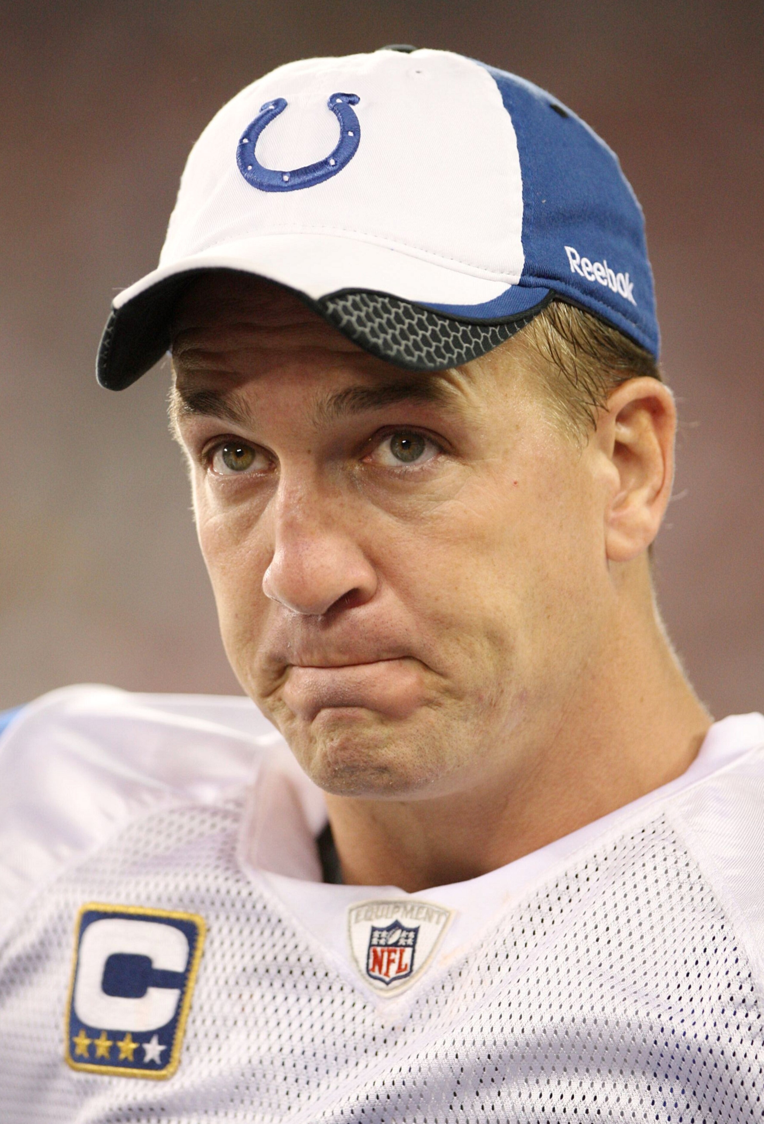 GLENDALE, AZ - SEPTEMBER 27:  Quarterback Peyton Manning #18 of the Indianapolis Colts looks on from the sideline in the second quarter against the Arizona Cardinals during the game at University of Phoenix Stadium on September 27, 2009 in Glendale, Arizo