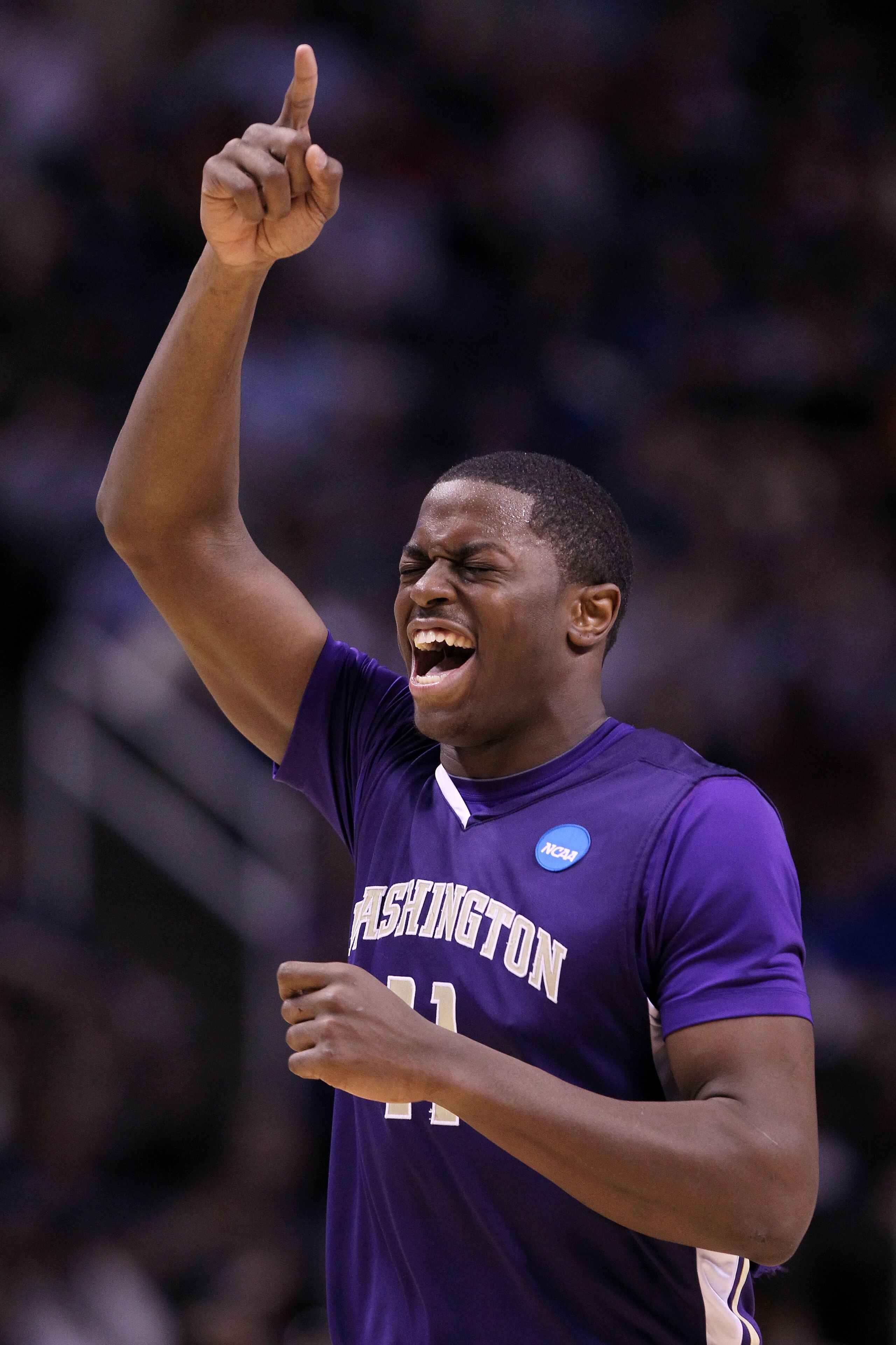SAN JOSE, CA - MARCH 20:  Forward Matthew Bryan-Amaning #11 of the Washington Huskies celebrates a play against the New Mexico Lobos during the second round of the 2010 NCAA men's basketball tournament at HP Pavilion on March 20, 2010 in San Jose, Califor