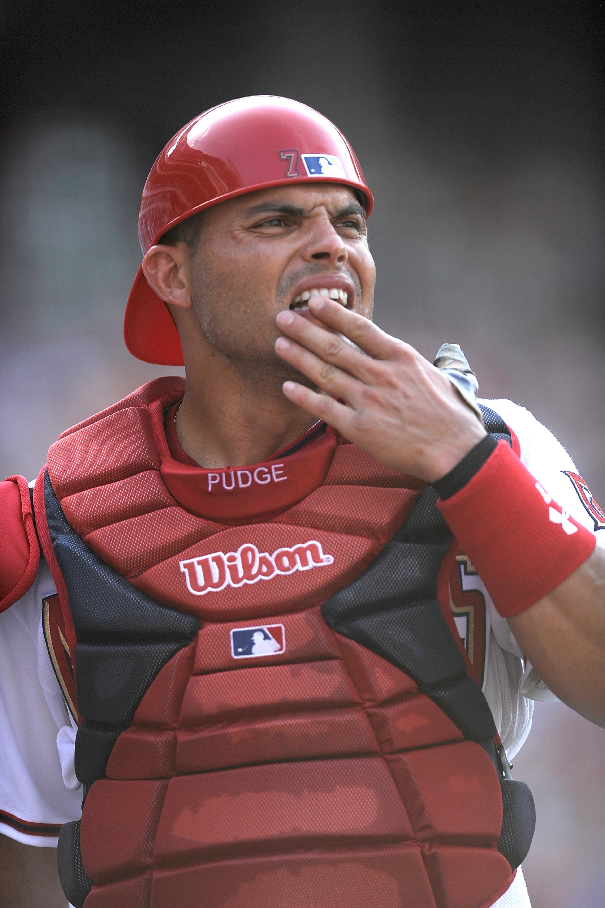 WASHINGTON - JUNE 23:  Ivan Rodriguez #7 of the Washington Nationals checks his mouth after being hit by a foul ball during the game against the Kansas City Royals at Nationals Park on June 23, 2010 in Washington, DC.  (Photo by Greg Fiume/Getty Images)
