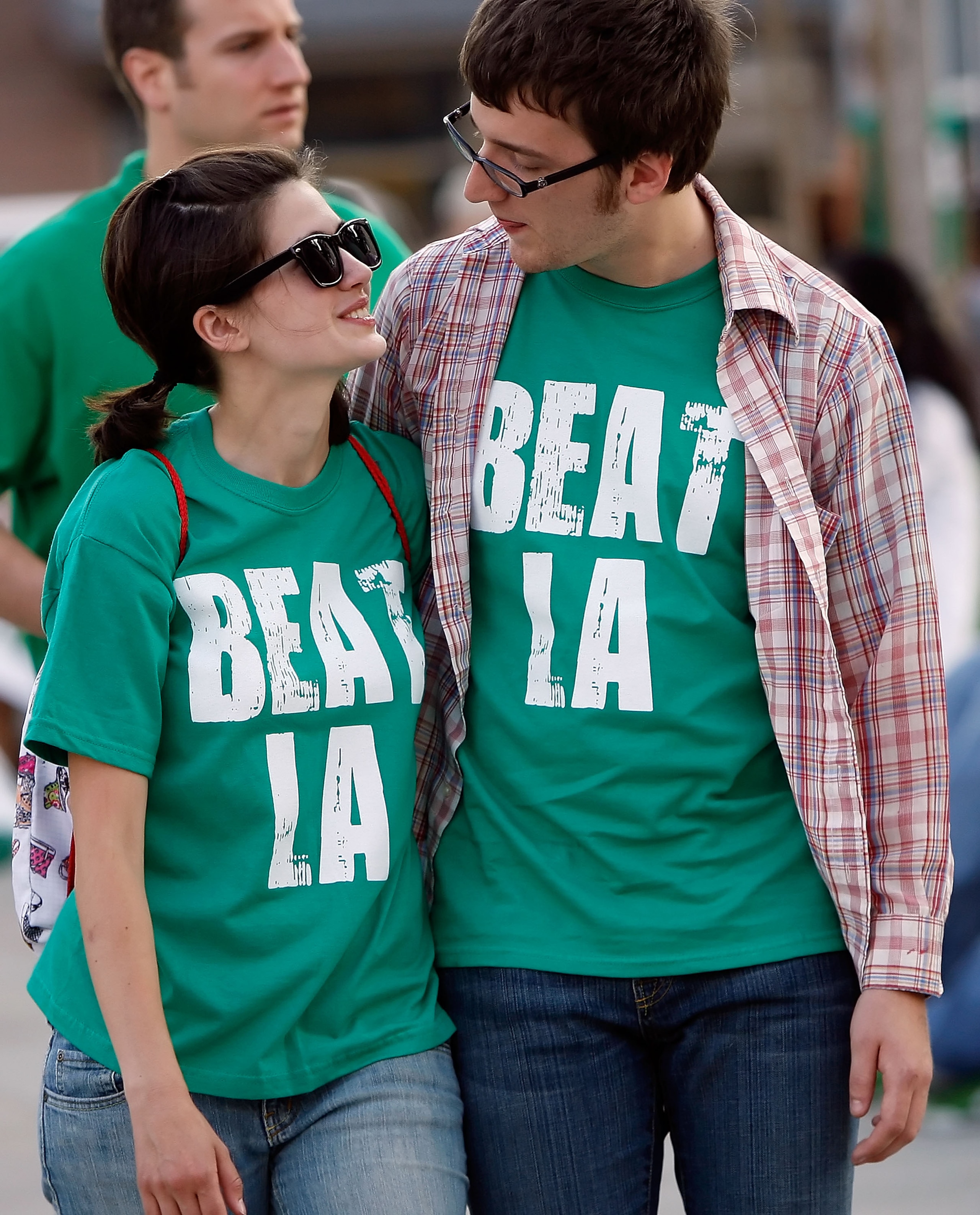 BOSTON - JUNE 17:  Boston Celtics fans walk down the street outside the TD Banknorth Garden before Game Six of the 2008 NBA Finals between the Los Angeles Lakers and the Celtics on June 17, 2008 at TD Banknorth Garden in Boston, Massachusetts. NOTE TO USE