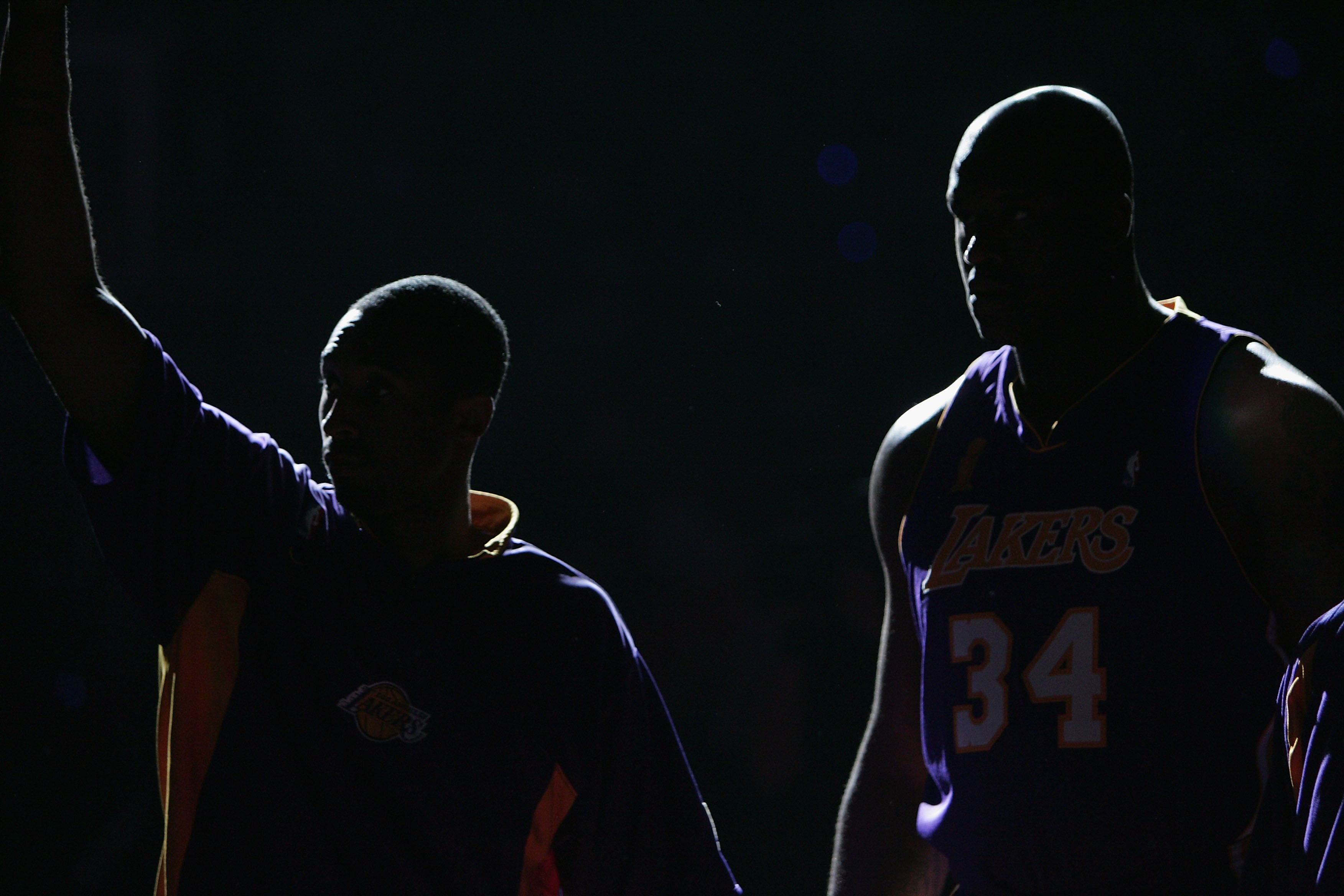 AUBURN HILLS, MI - JUNE 15:  Kobe Bryant #8 (left) and Shaquille O'Neal #34 of the Los Angeles Lakers are introduced against the Detroit Pistons before game five of the 2004 NBA Finals on June 15, 2004 at The Palace of Auburn Hills in Auburn Hills, Michig