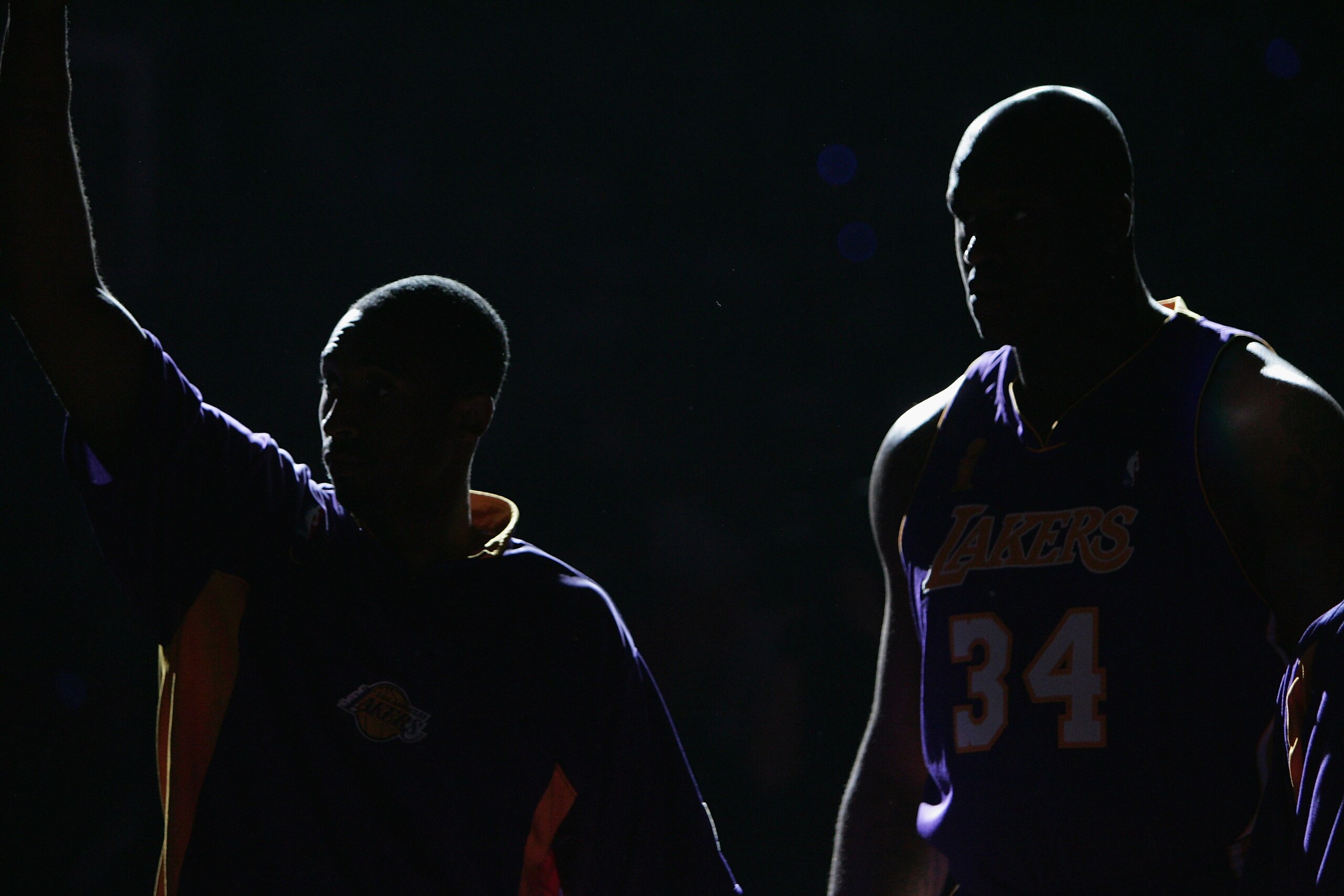 AUBURN HILLS, MI - JUNE 15:  Kobe Bryant #8 (left) and Shaquille O'Neal #34 of the Los Angeles Lakers are introduced against the Detroit Pistons before game five of the 2004 NBA Finals on June 15, 2004 at The Palace of Auburn Hills in Auburn Hills, Michig