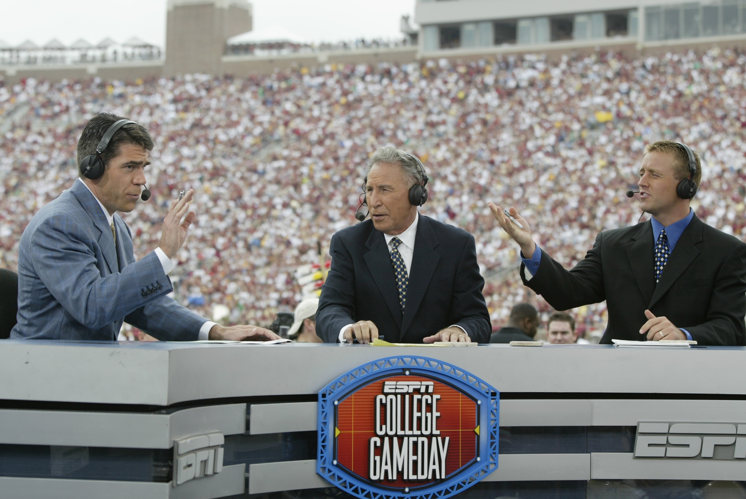 TALLAHASSEE, FL - OCTOBER 26:  ESPN College GameDay announcers (l to r) Chris Fowler, Lee Corso and Kirk Herbstreit comment during the NCAA football game between Notre Dame and Florida State at Doak Campbell Stadium on October 26, 2002 in Tallahassee, Flo