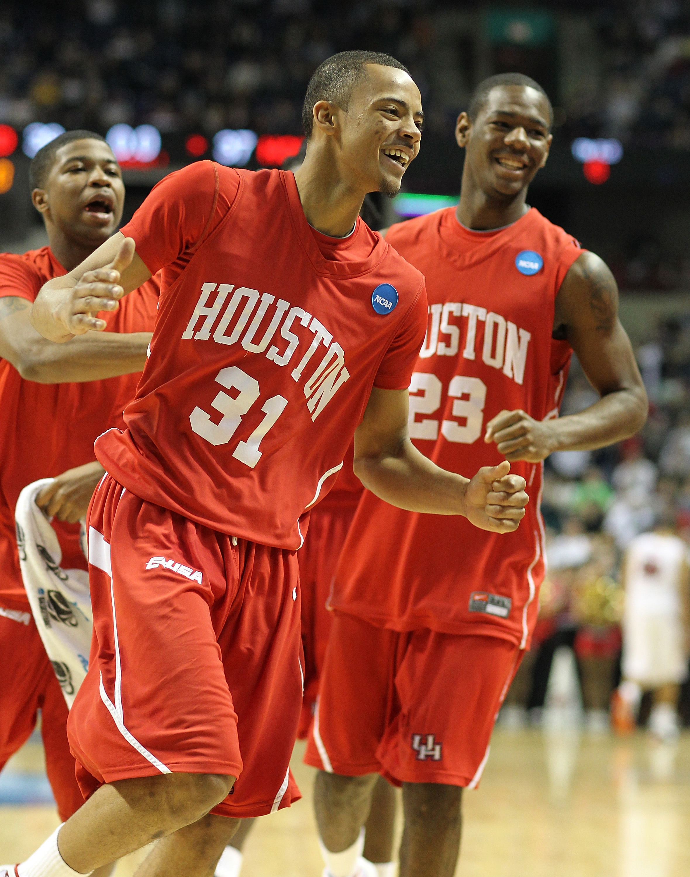 SPOKANE - MARCH 19: Adam Brown #31 of the Houston Cougars celebrates after hitting a three-point shot with time expiring in the first half against the Maryland Terrapins in the first round of the 2010 NCAA men's basketball tournament at the Spokane Arena
