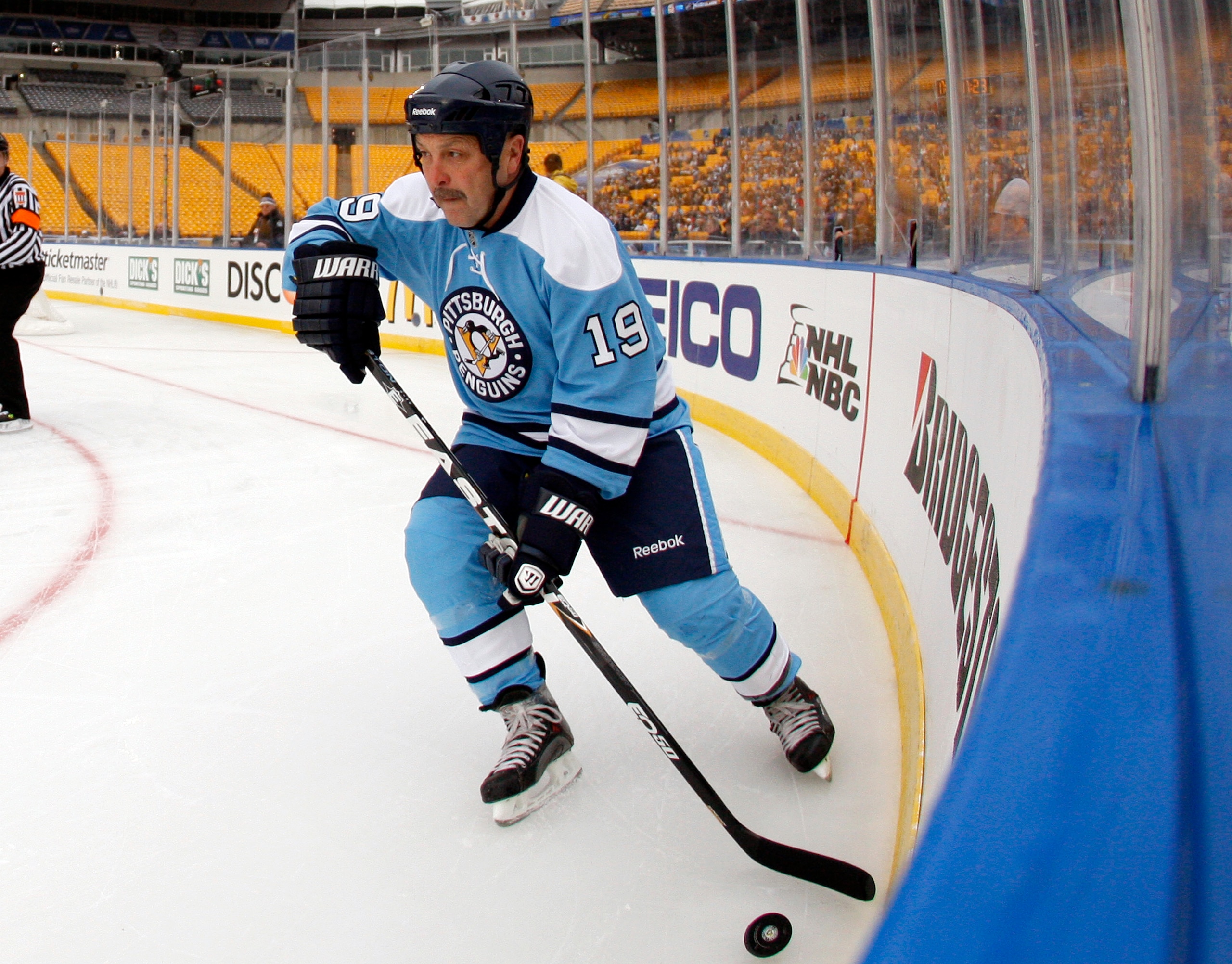 PITTSBURGH, PA - DECEMBER 31:  Bryan Trottier #19 of the Pittsburgh Penguins carries the puck against the Washington Captials during the 2011 NHL Winter Classic Alumni Game on December 31, 2010 at Heinz Field in Pittsburgh, Pennsylvania.  (Photo by Justin