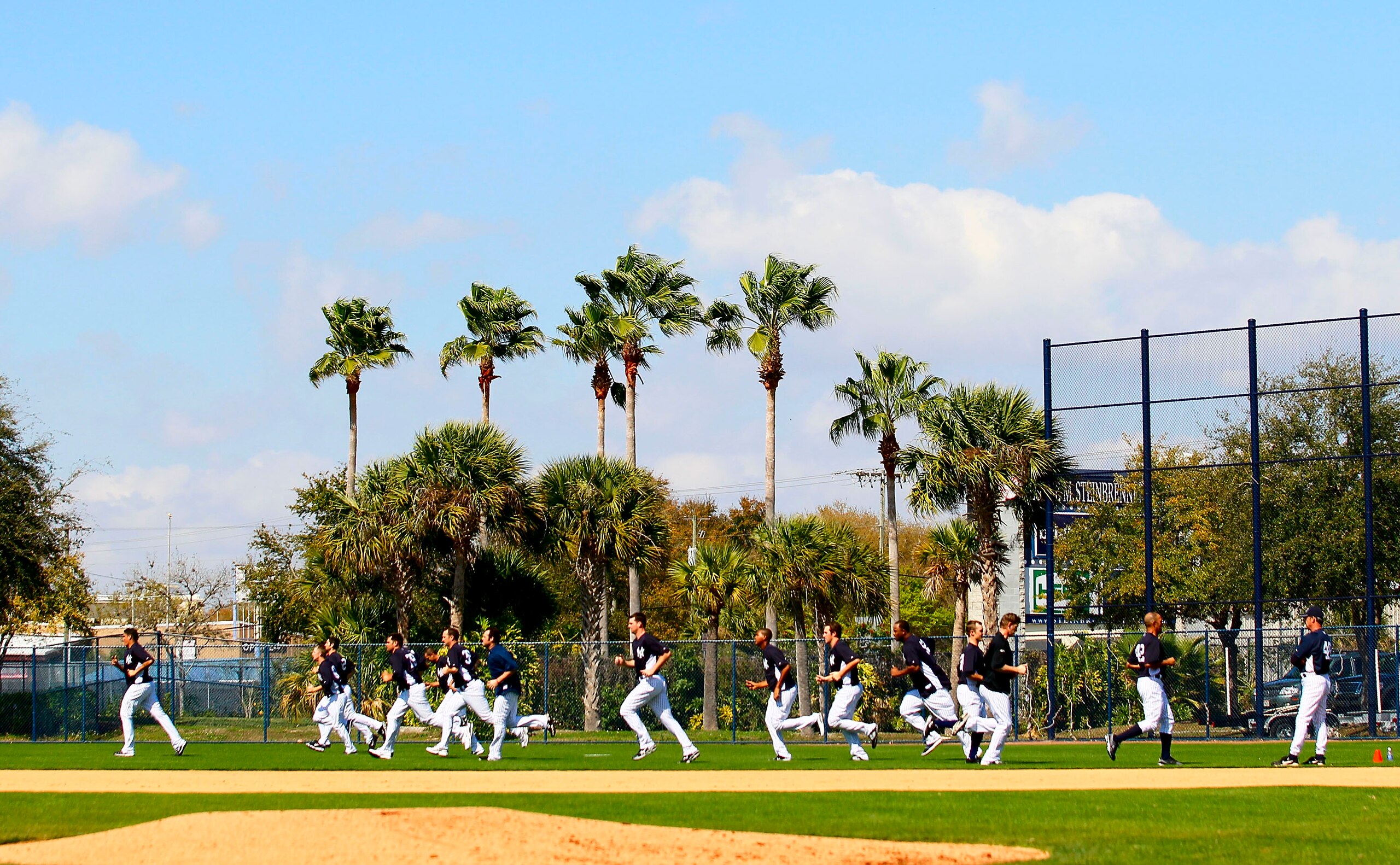 TAMPA, FL - FEBRUARY 21:  The New York Yankees run on the field during their second day of full teams workouts at Spring Training on February 21, 2011 at the George M. Steinbrenner Field in Tampa, Florida.  (Photo by Leon Halip/Getty Images)