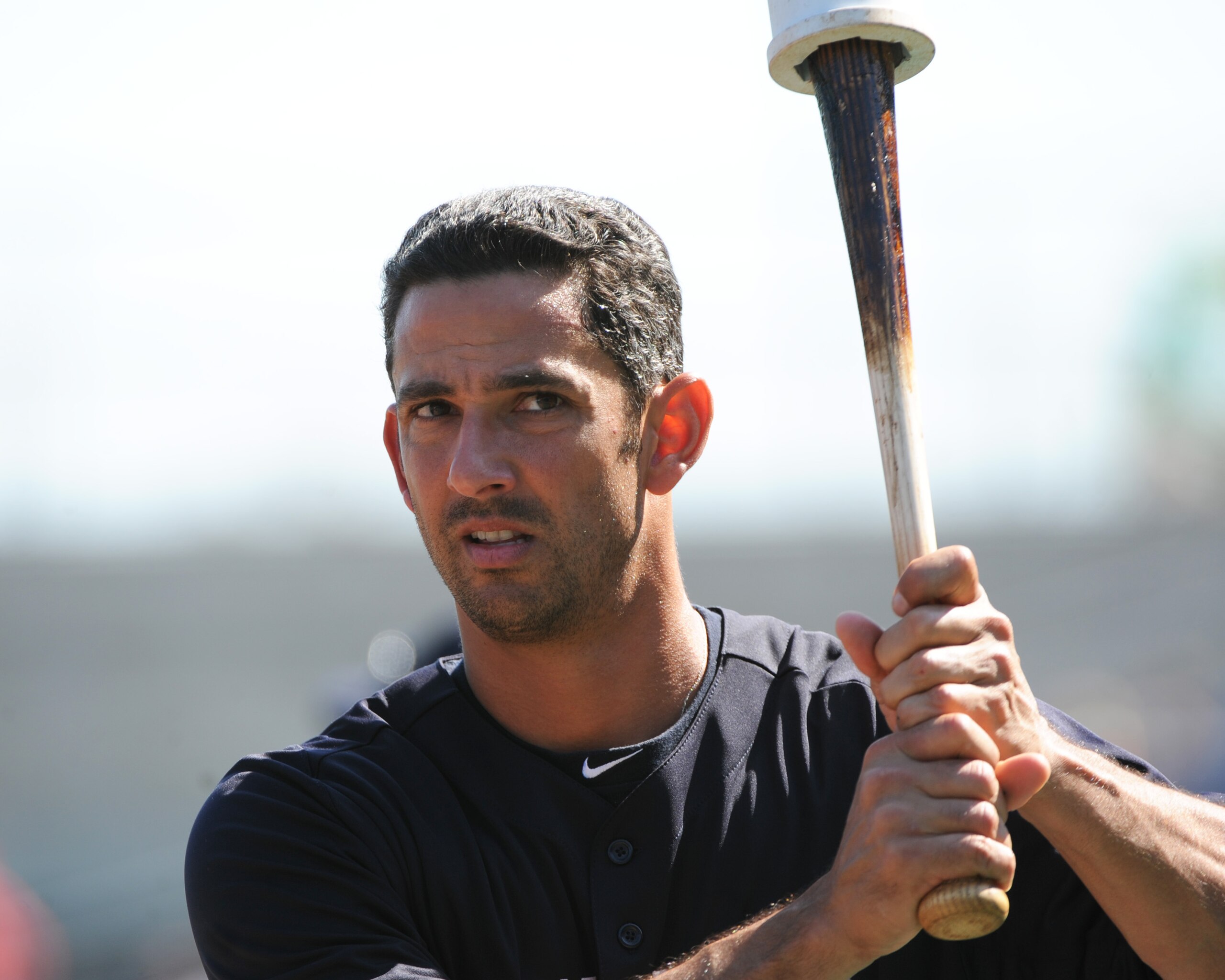 CLEARWATER, FL - FEBRUARY 27:  Designated hitter Jorge Posada #20 of the New York Yankees warms up before play against the Philadelphia Phillies February 27, 2011 at Bright House Field in Clearwater, Florida.  (Photo by Al Messerschmidt/Getty Images)