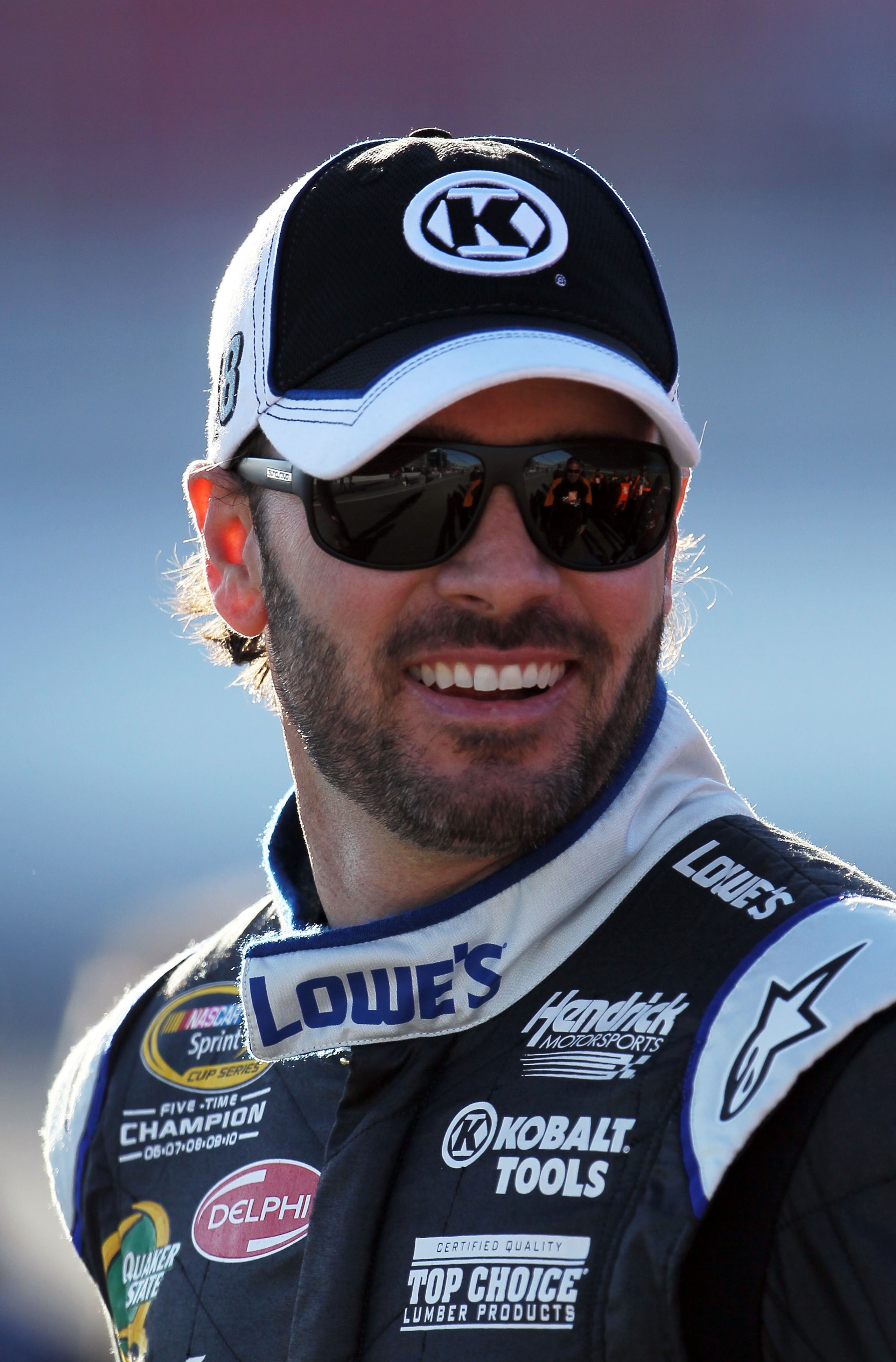 LAS VEGAS, NV - MARCH 04:  Jimmie Johnson, driver of the #48 Lowe's/Kobalt Tools Chevrolet, stands on the grid during qualifying for the NASCAR Sprint Cup Series Kobalt Tools 400 at Las Vegas Motor Speedway on March 4, 2011 in Las Vegas, Nevada.  (Photo b