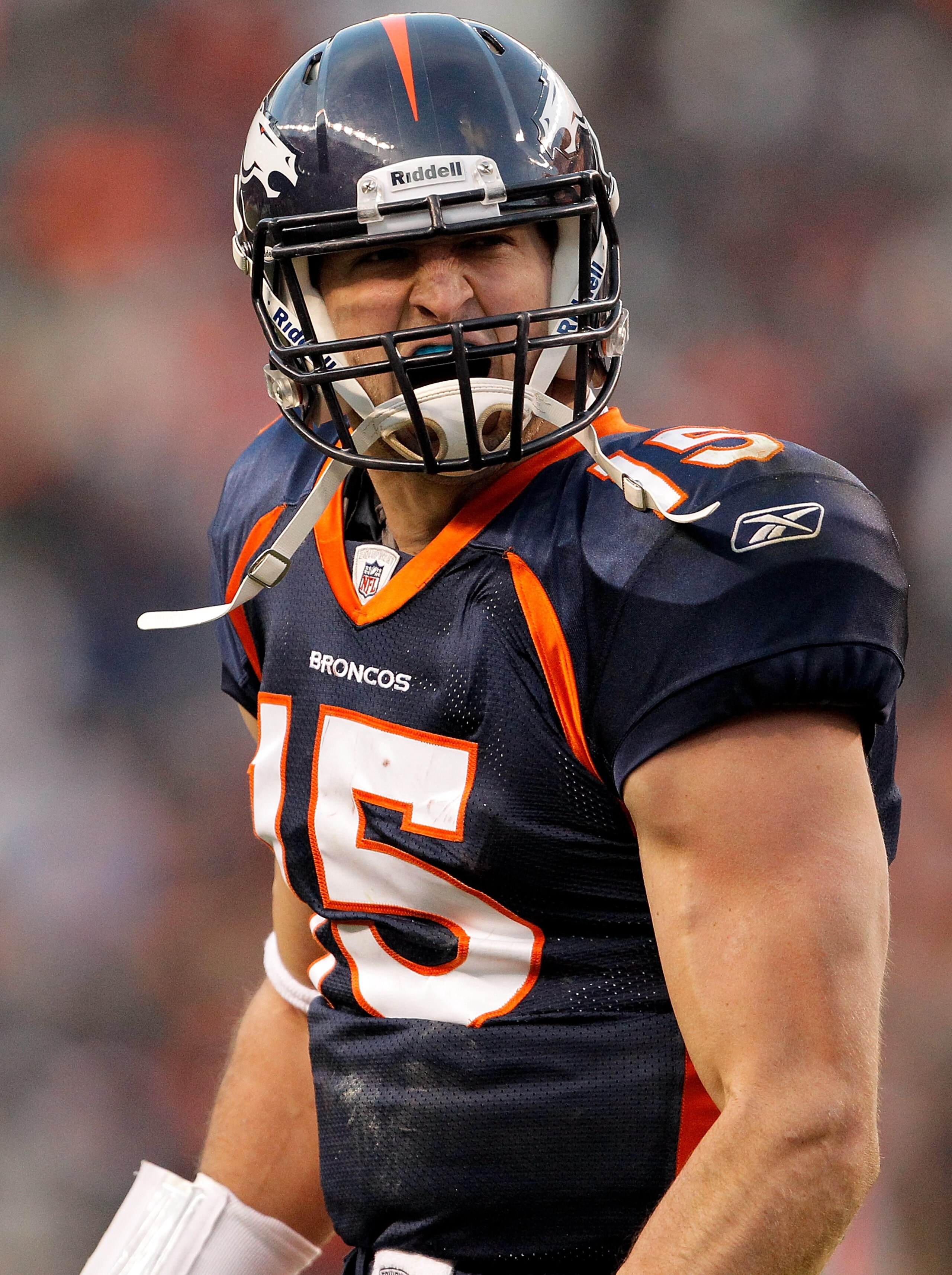 DENVER, CO - JANUARY 2: Quarterback Tim Tebow #15 of the Denver Broncos celebrates a touchdown pass to Eric Decker during the third quarter against the San Diego Chargers at INVESCO Field at Mile High on January 2, 2011 in Denver, Colorado. (Photo by Jus DENVER, CO - JANUARY 2: Quarterback Tim Tebow #15 of the Denver Broncos celebrates a touchdown pass to Eric Decker during the third quarter against the San Diego Chargers at INVESCO Field at Mile High on January 2, 2011 in Denver, Colorado. (Photo by Jus